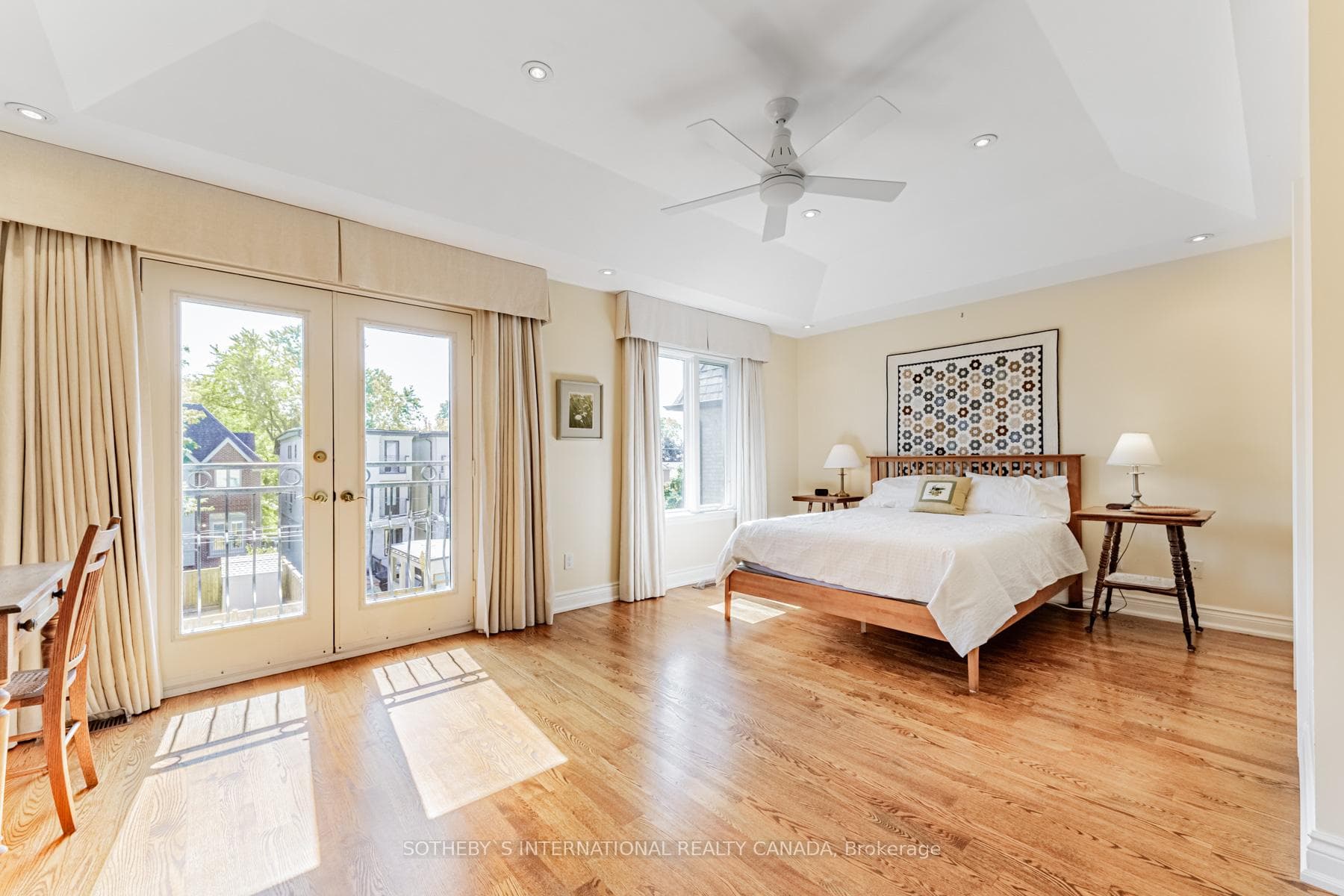 Primary suite with Juliette balcony.