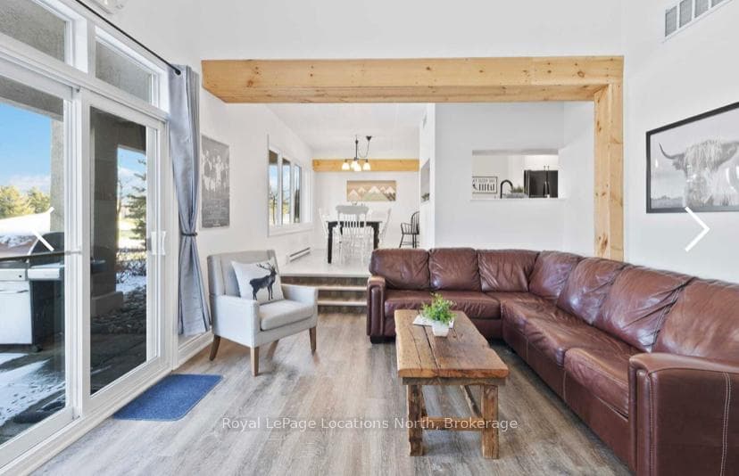 Living Room with access to back patio BBQ area.