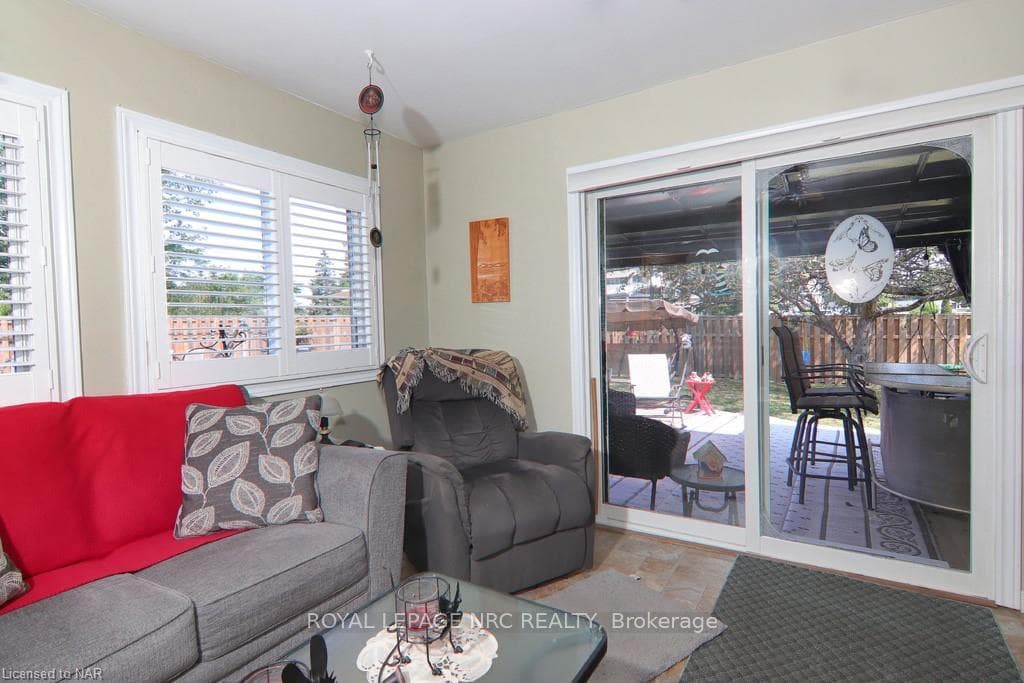 Sunroom w/walk out sliders to Back Patio