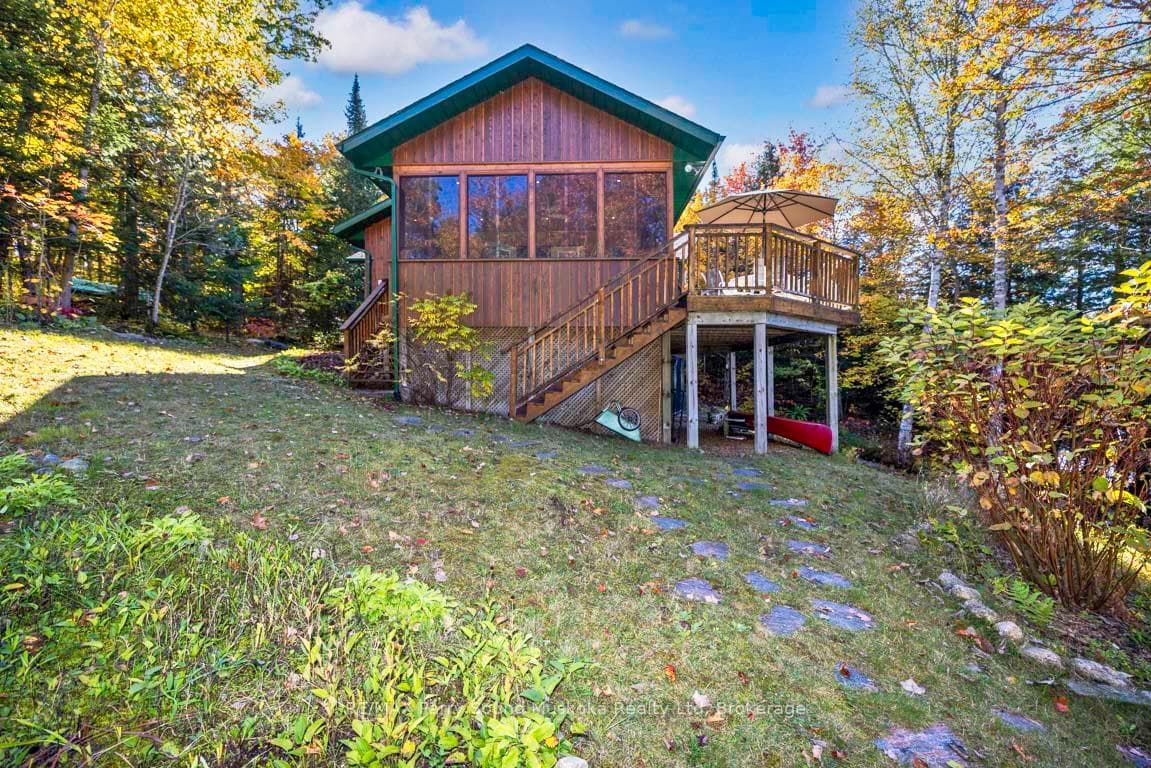 Desirable pine-enhanced sunroom