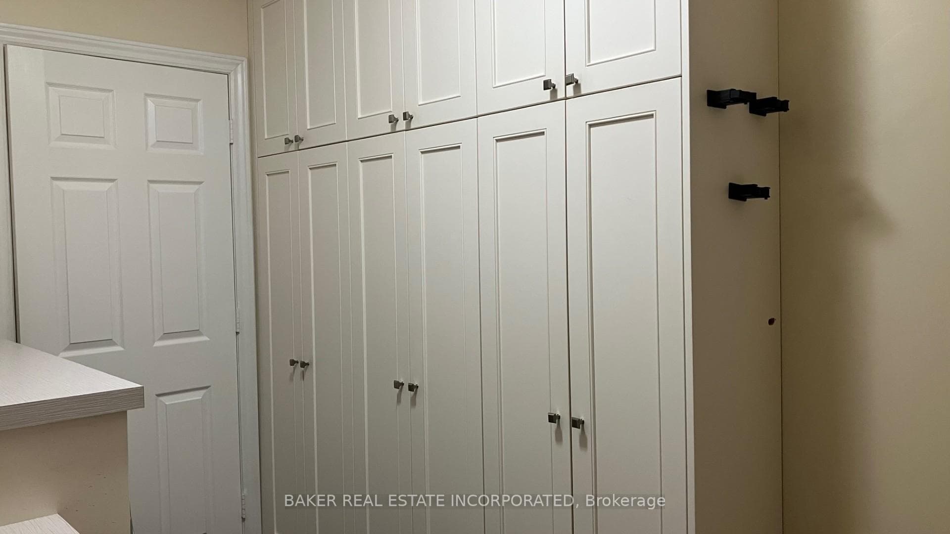 Unit 113 Pantry in Laundry Room