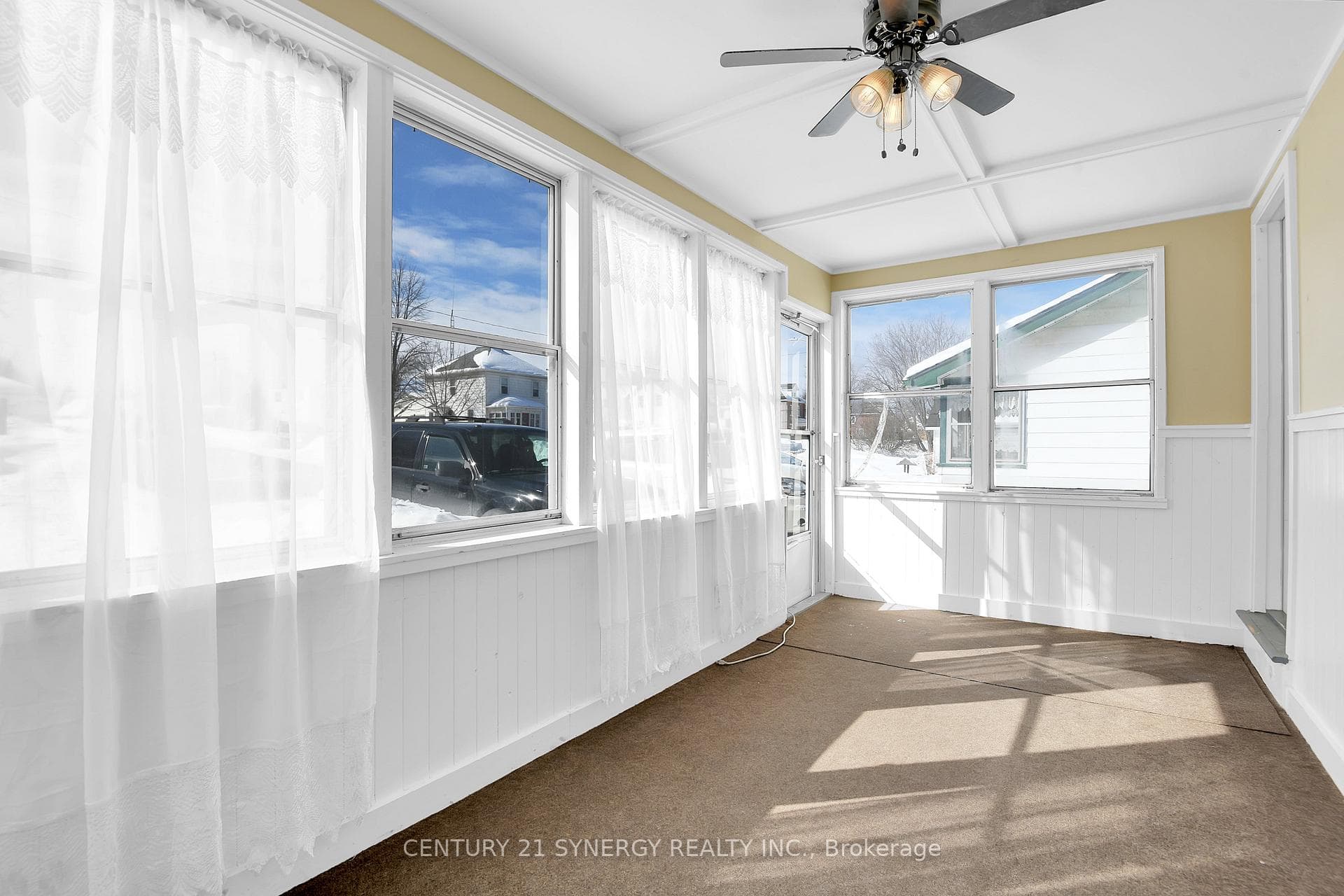 Bright and airy sunroom.