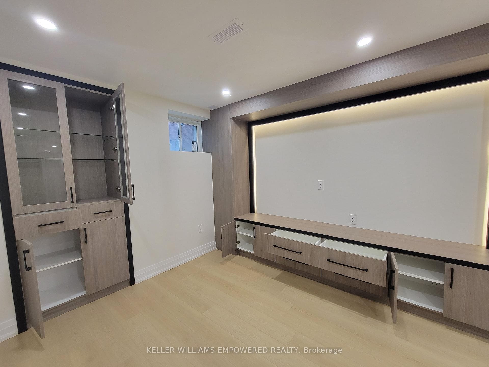TV wall, built-in shelves and display cabinets