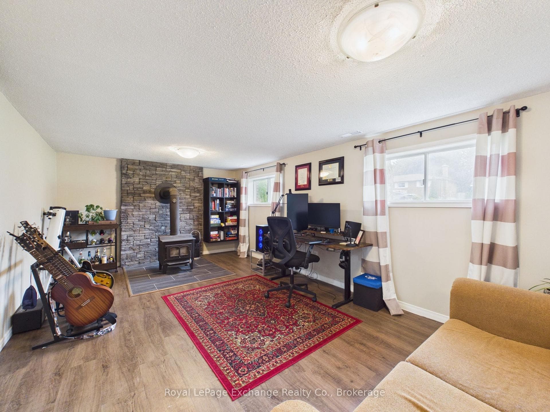 Family room - above grade windows, wood stove