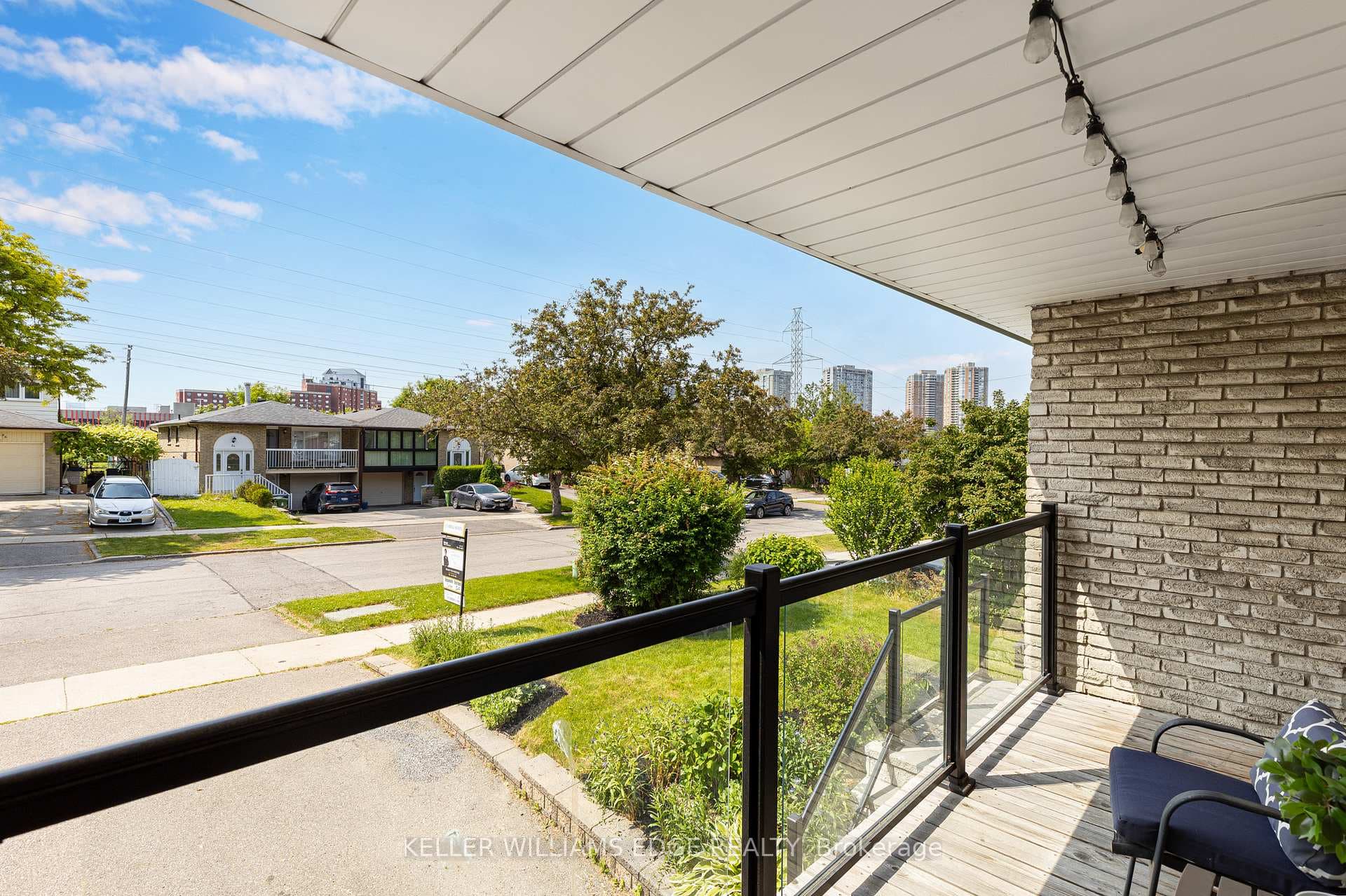 Walk-out to balcony with glass railings