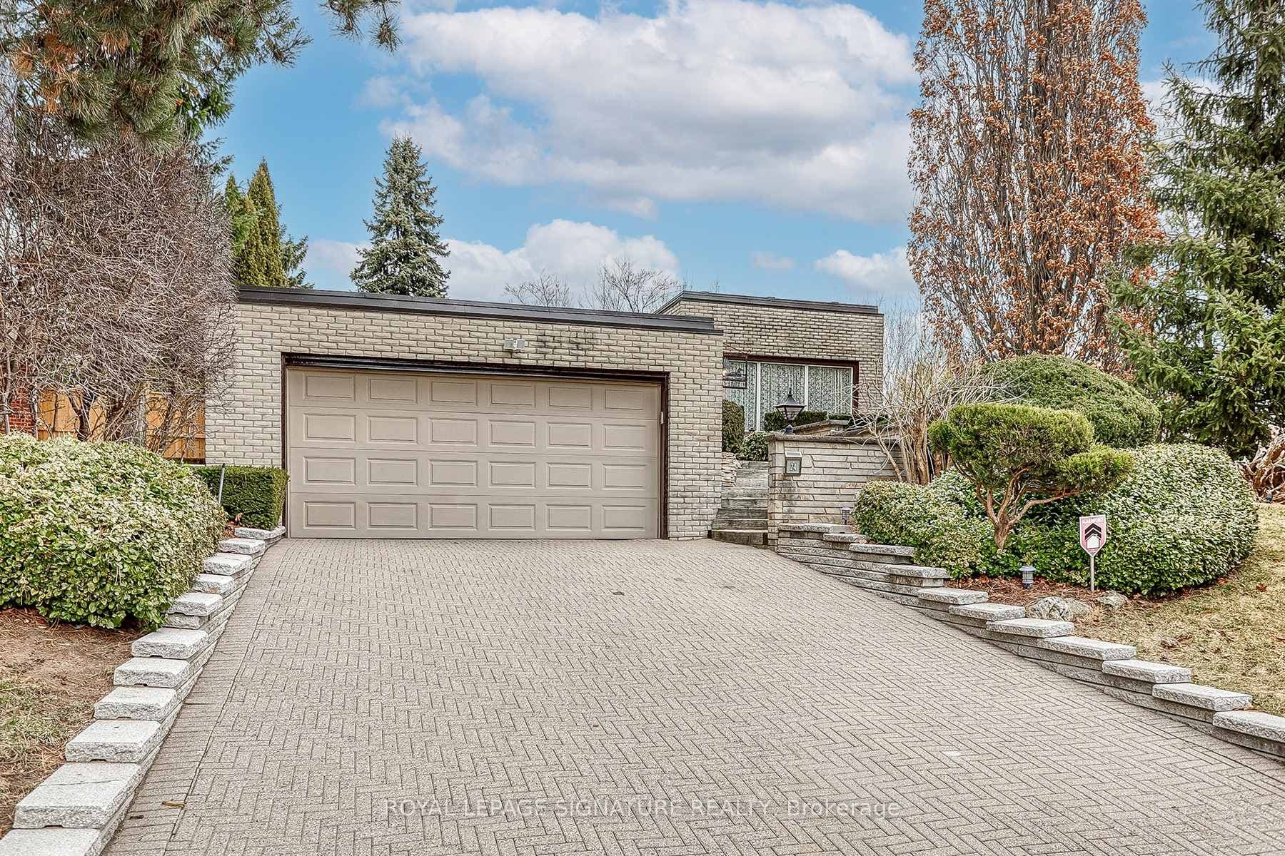 Double car garage and interlocking driveway