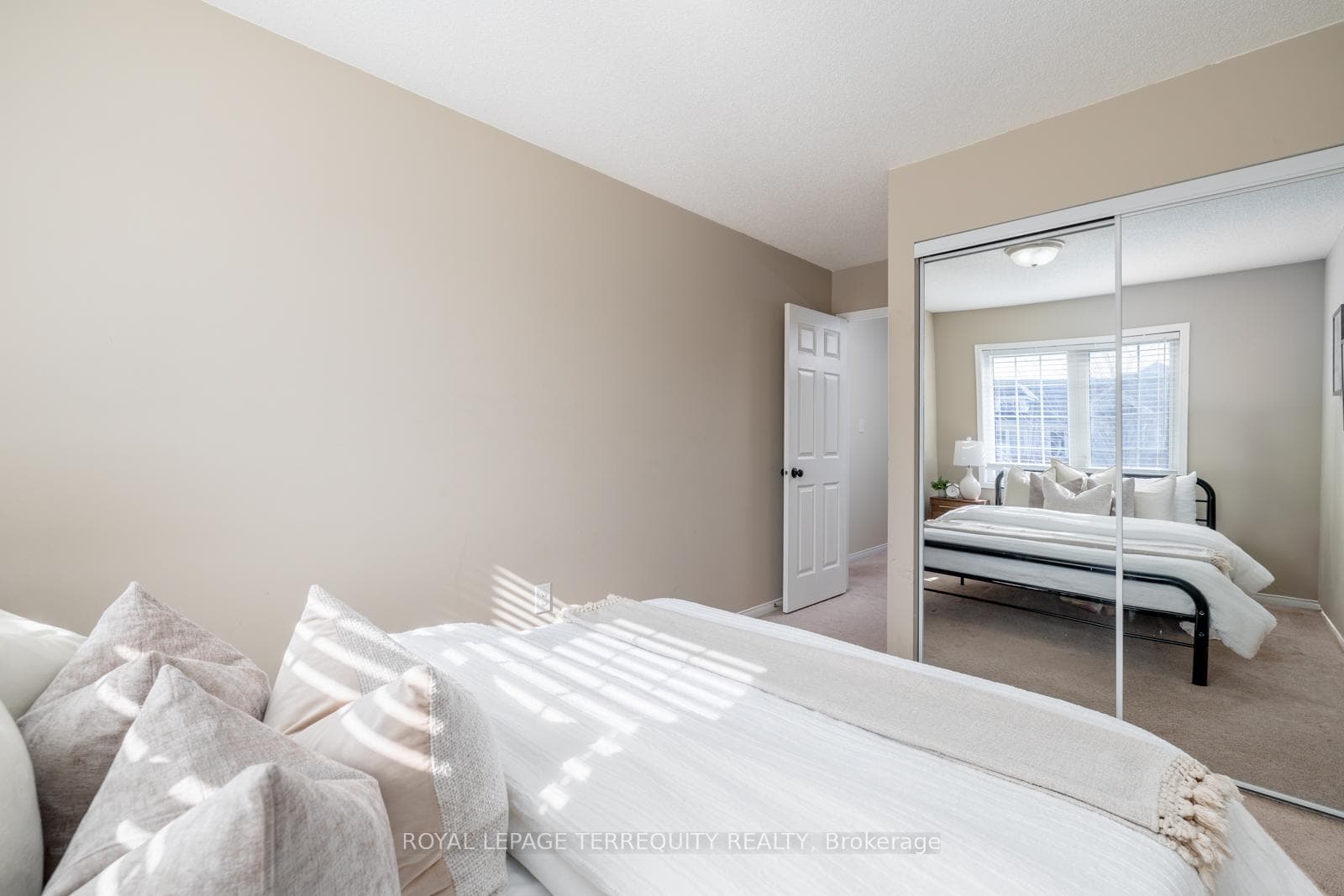 2nd Bedroom With Mirrored Closet Doors