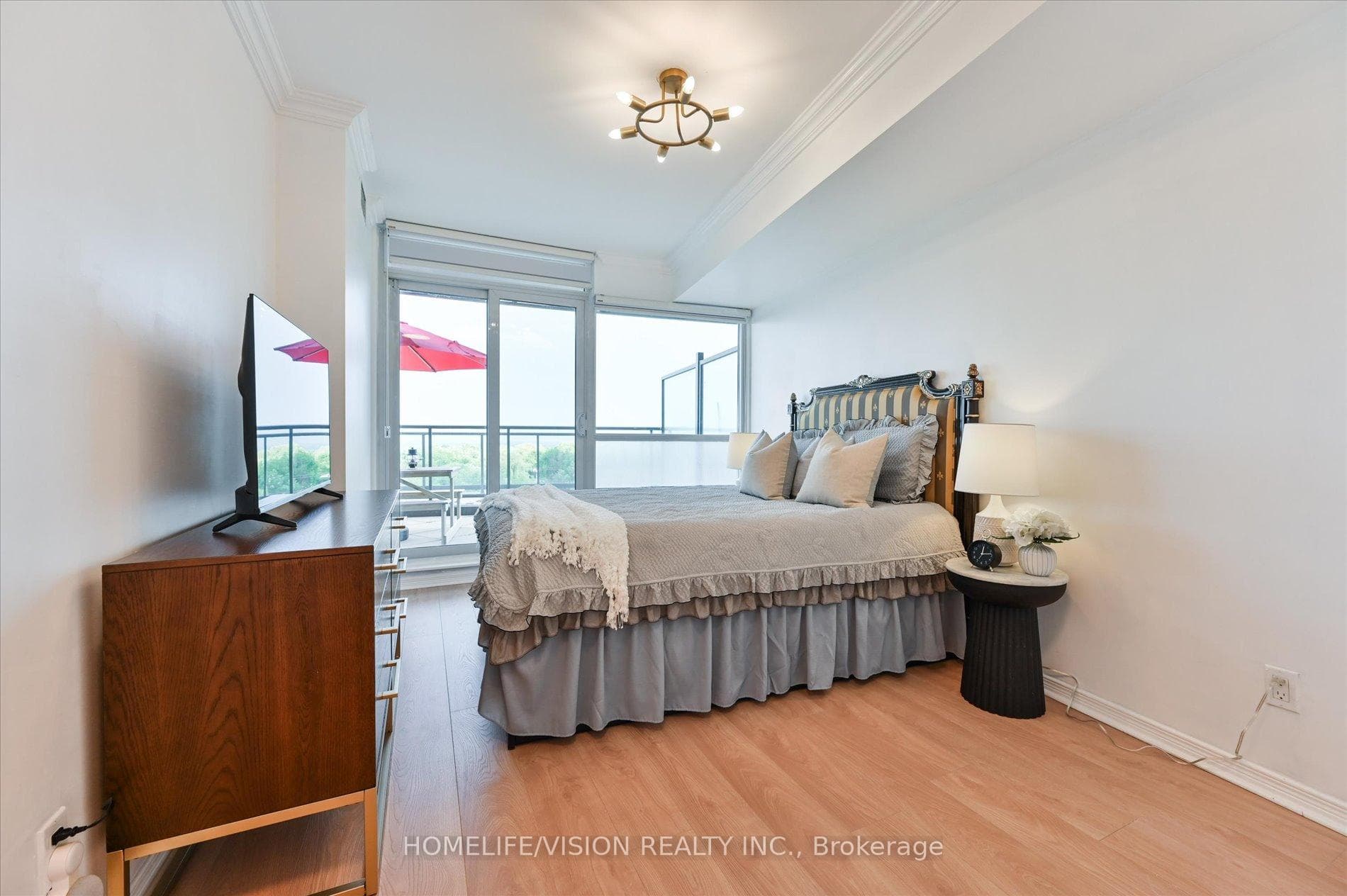 Primary Bedroom With Sliding Doors To Terrace