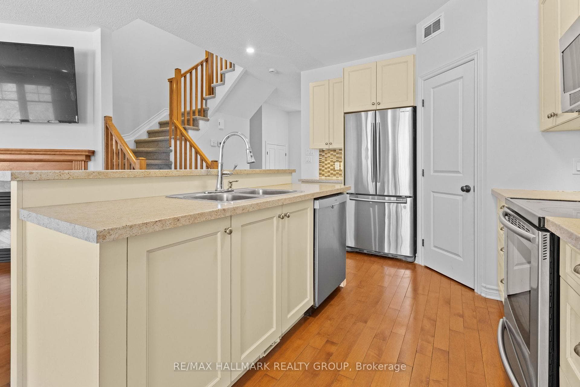 Kitchen island with sink and cabinets