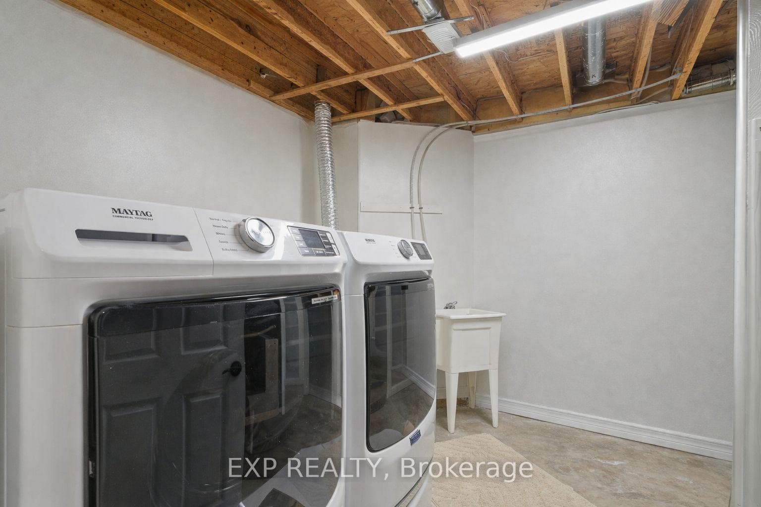 In-Law Suite Laundry Room (decluttered by AI)