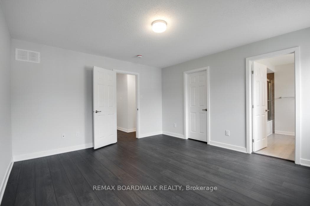 Primary bedroom with walk in closet and ensuite