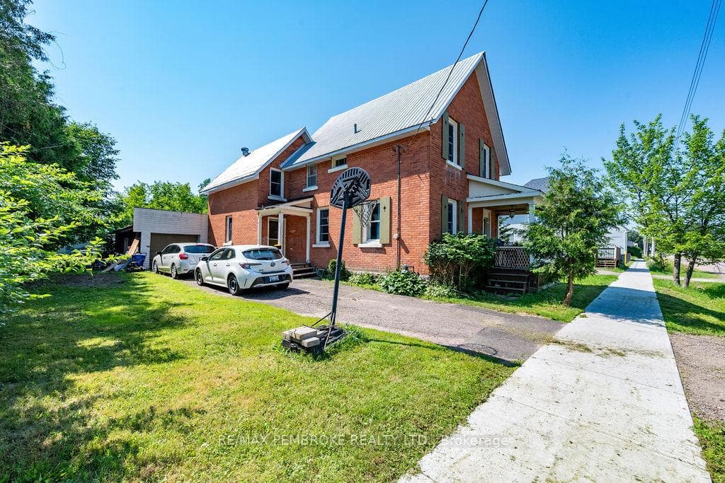 Single car garage and paved drive