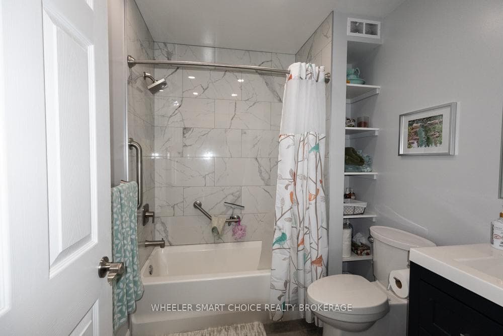 Beautiful tiles in the updated main floor bathroom