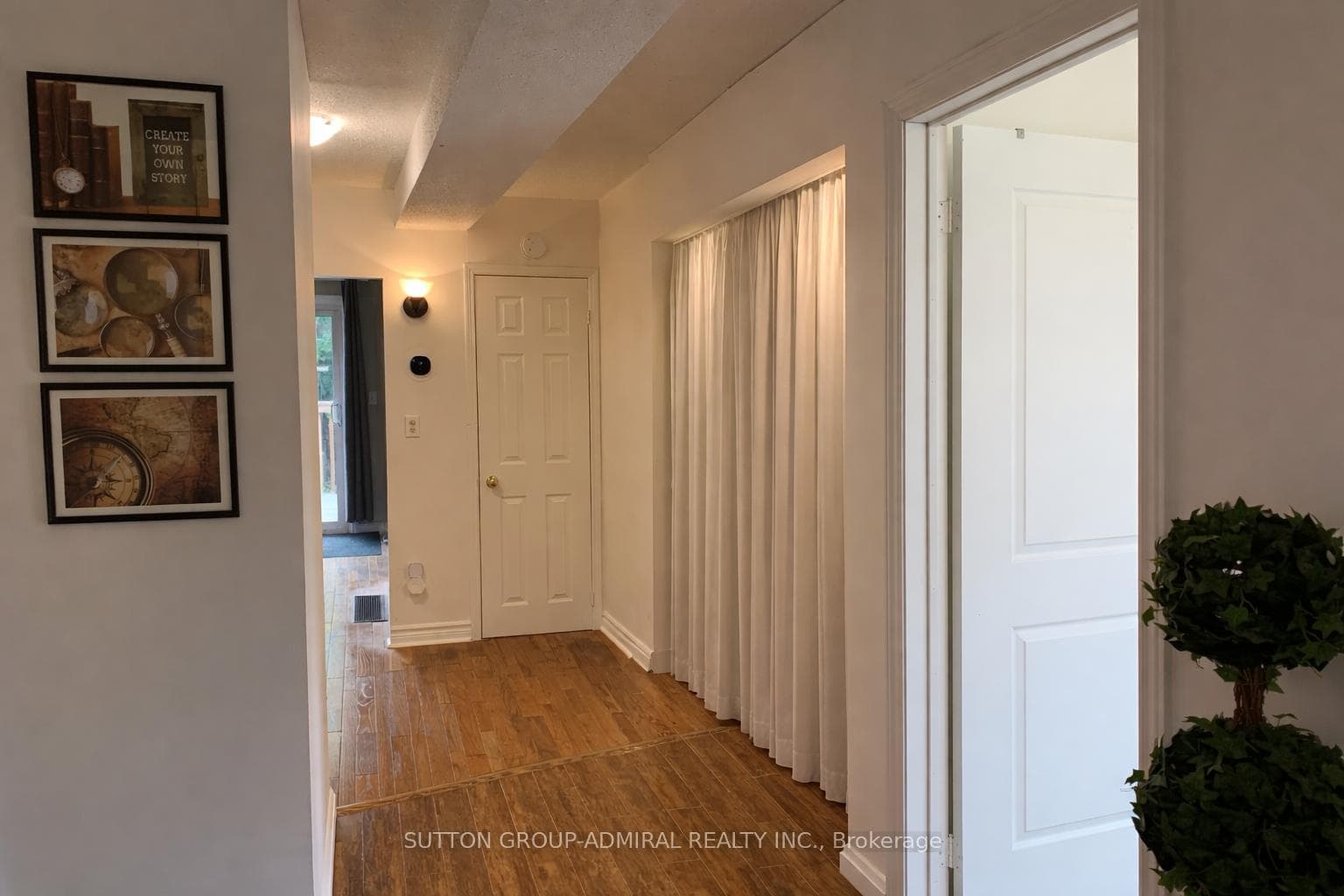 Front Entrance Hallway Leading To LR/Kitchen