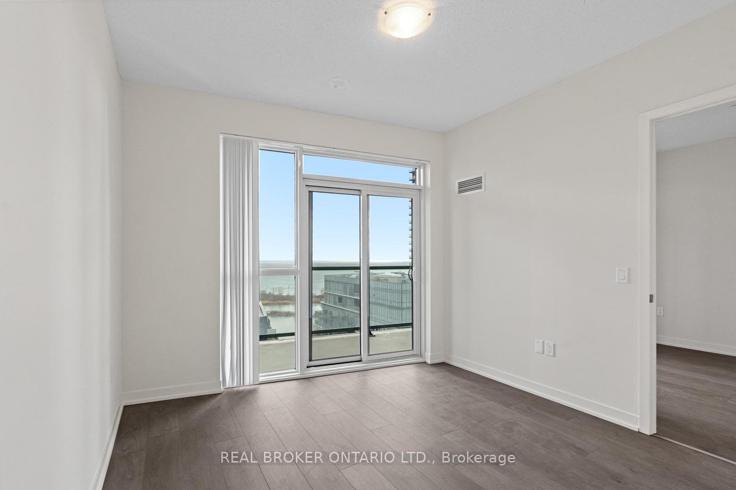Bedroom with walk-out to balcony