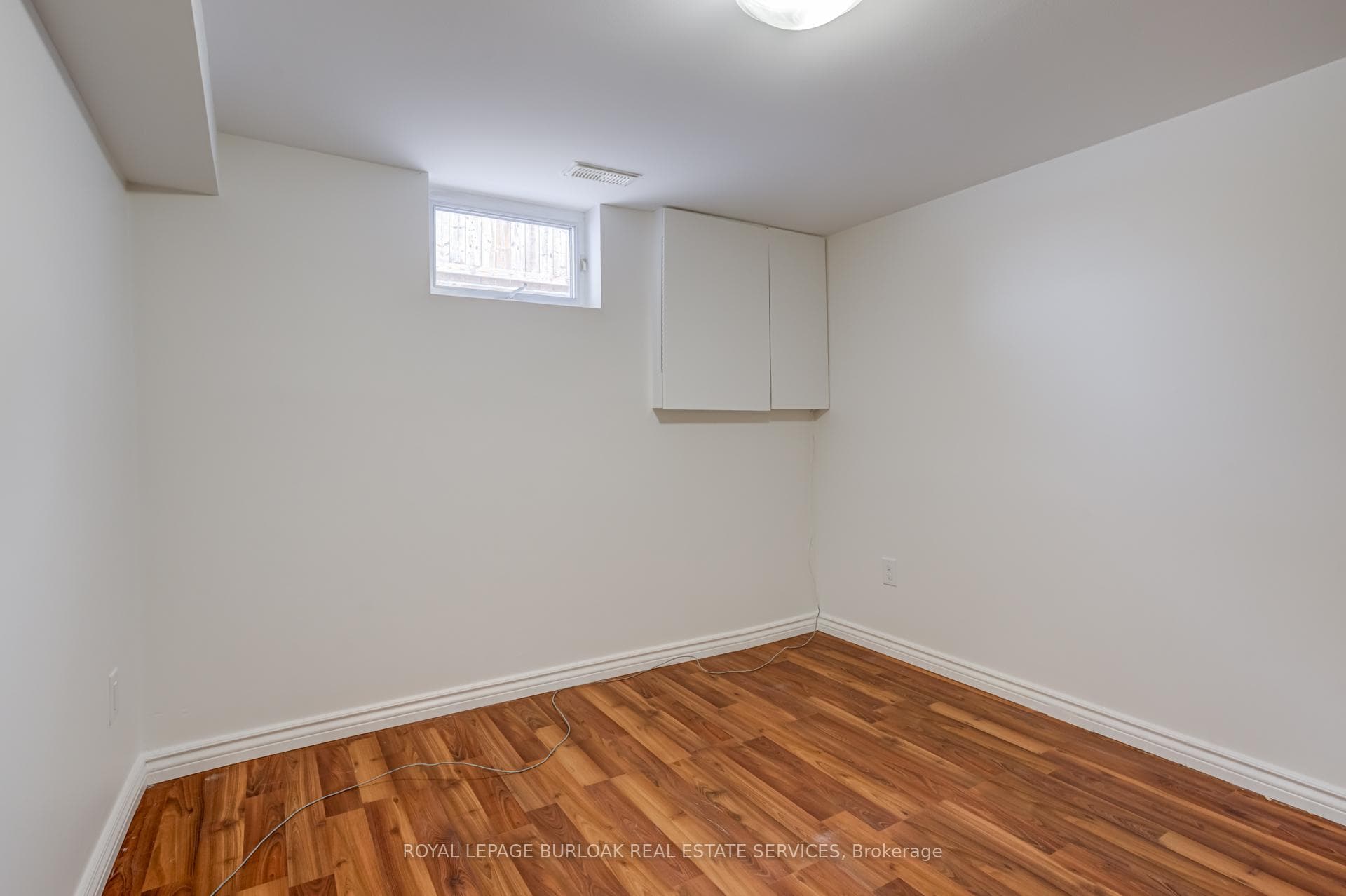 Basement level primary bedroom