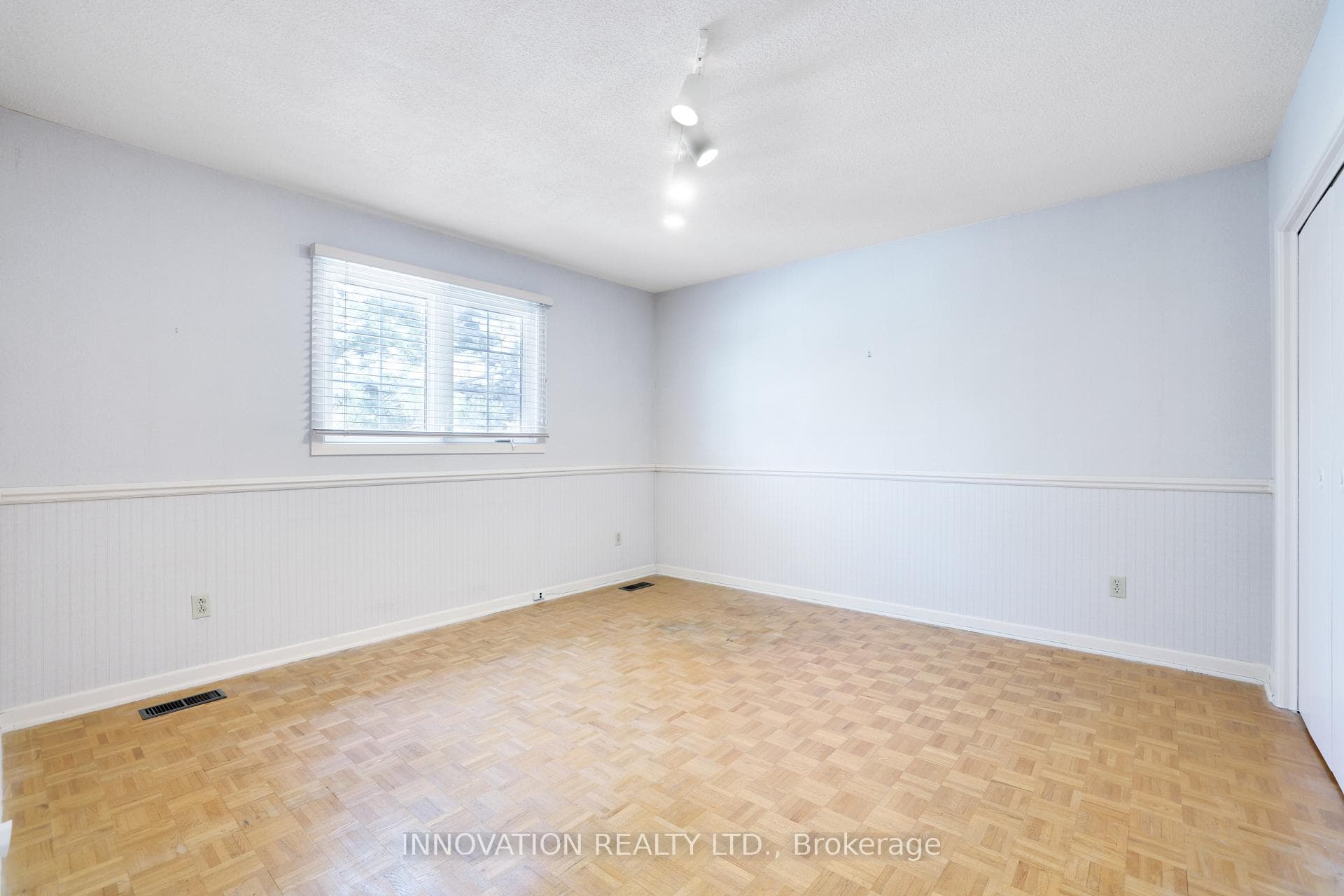 one of four spacious bedrooms