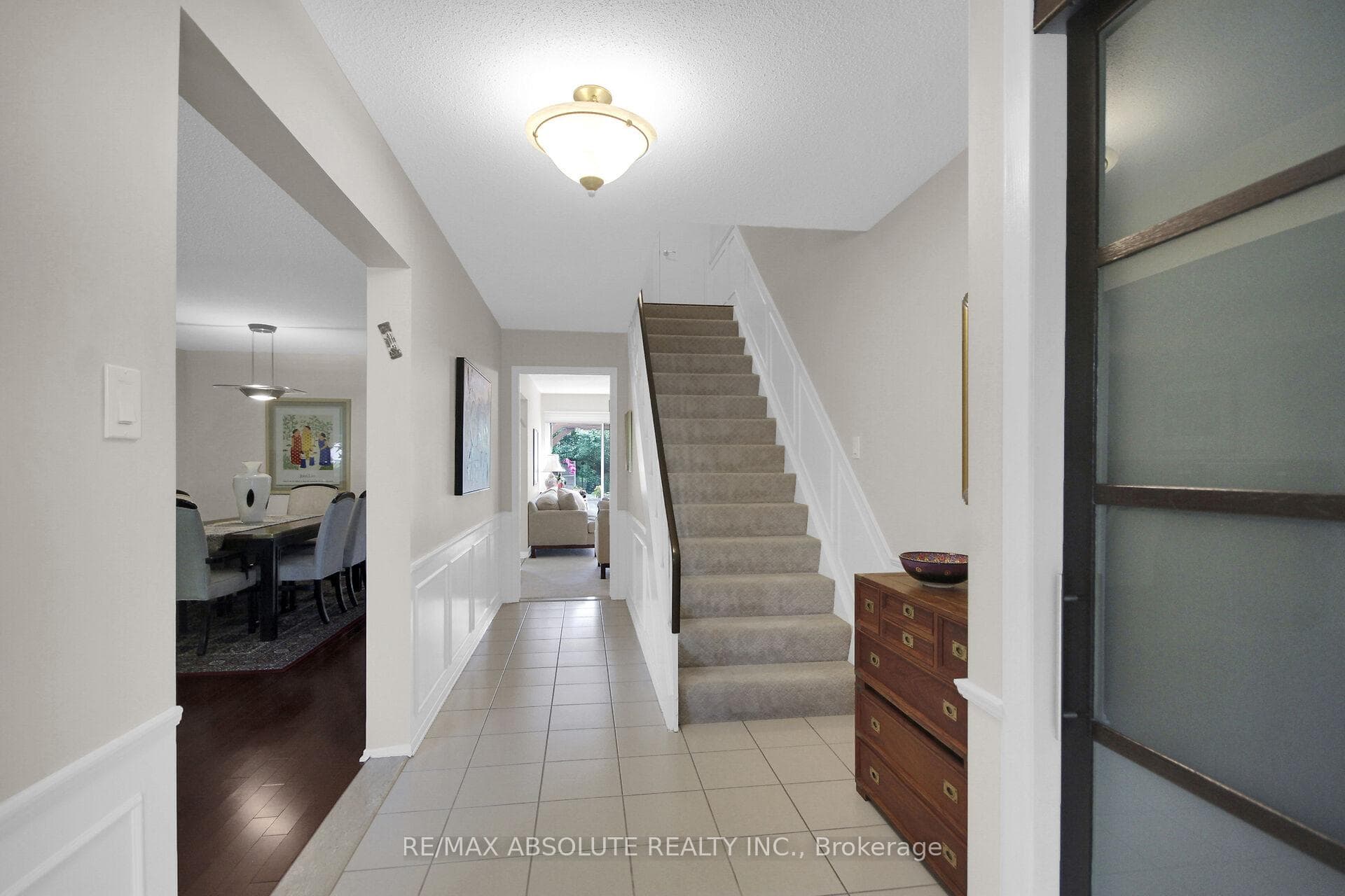 Inviting Foyer with Ceramic Floors