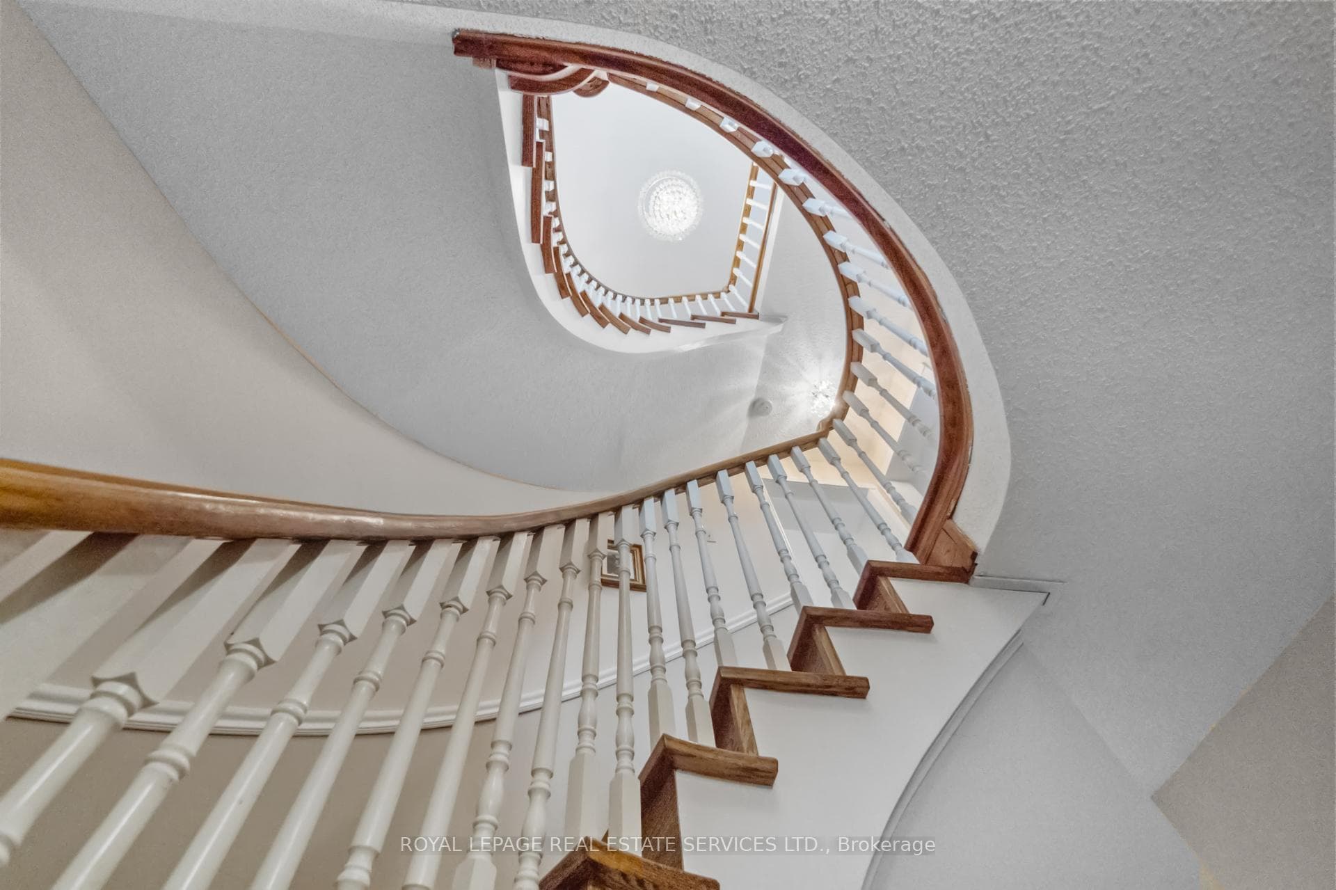 Spiral Staircase Facing Second Level