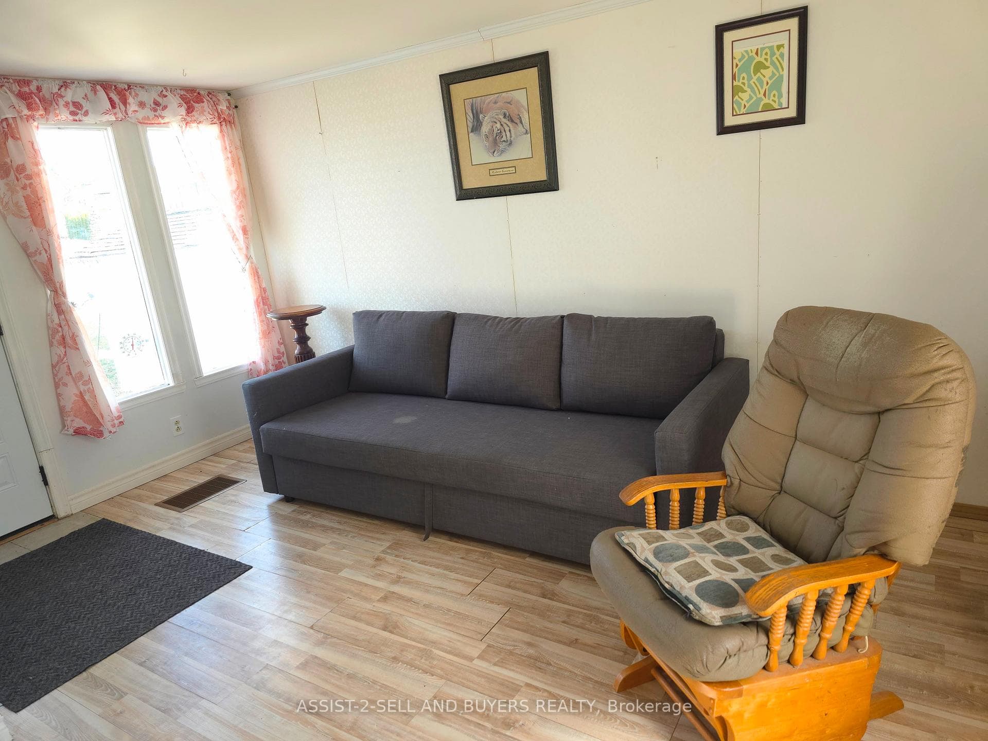 A nice full size front window in the living room.