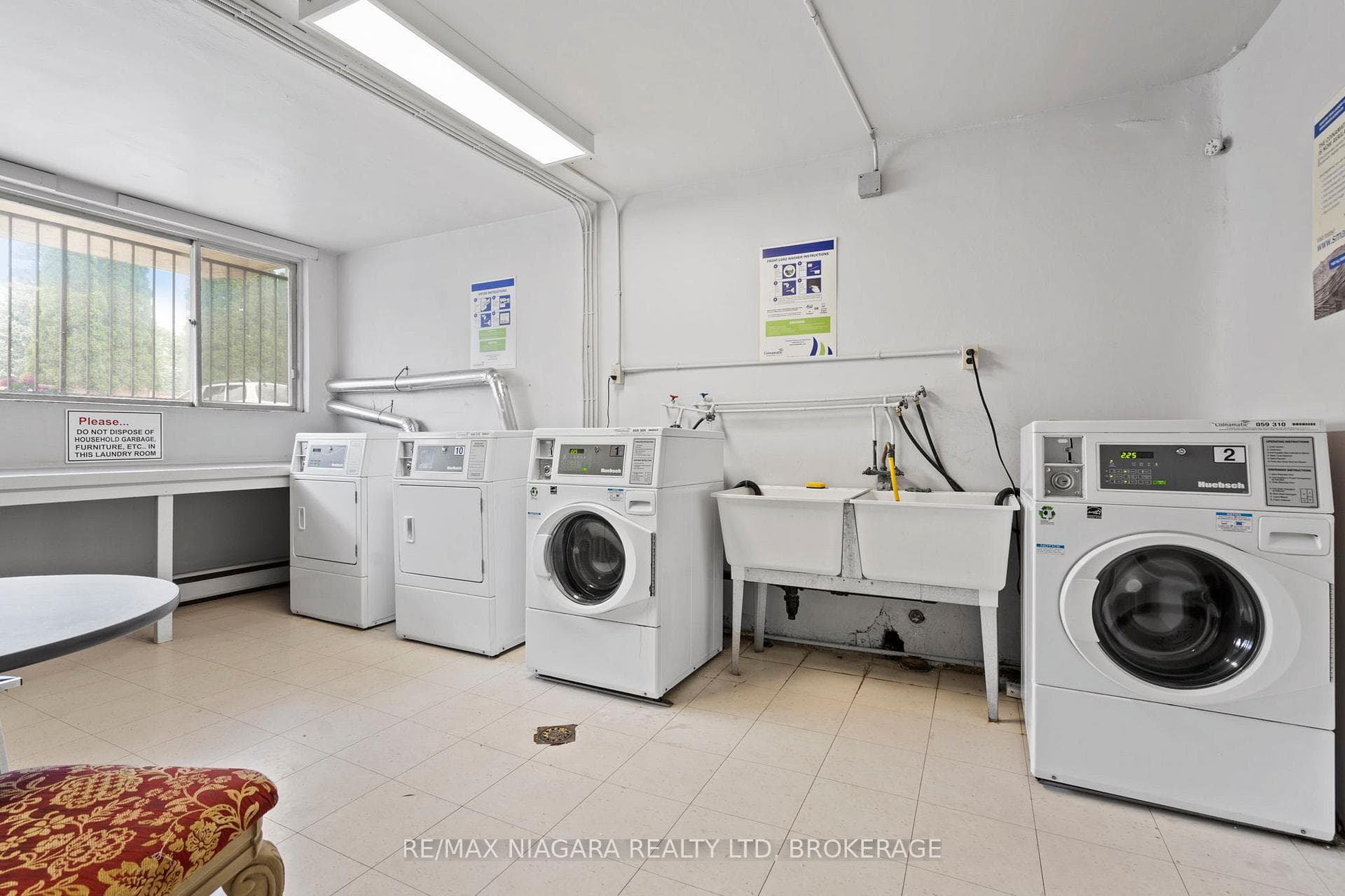 Coin operated laundry in building