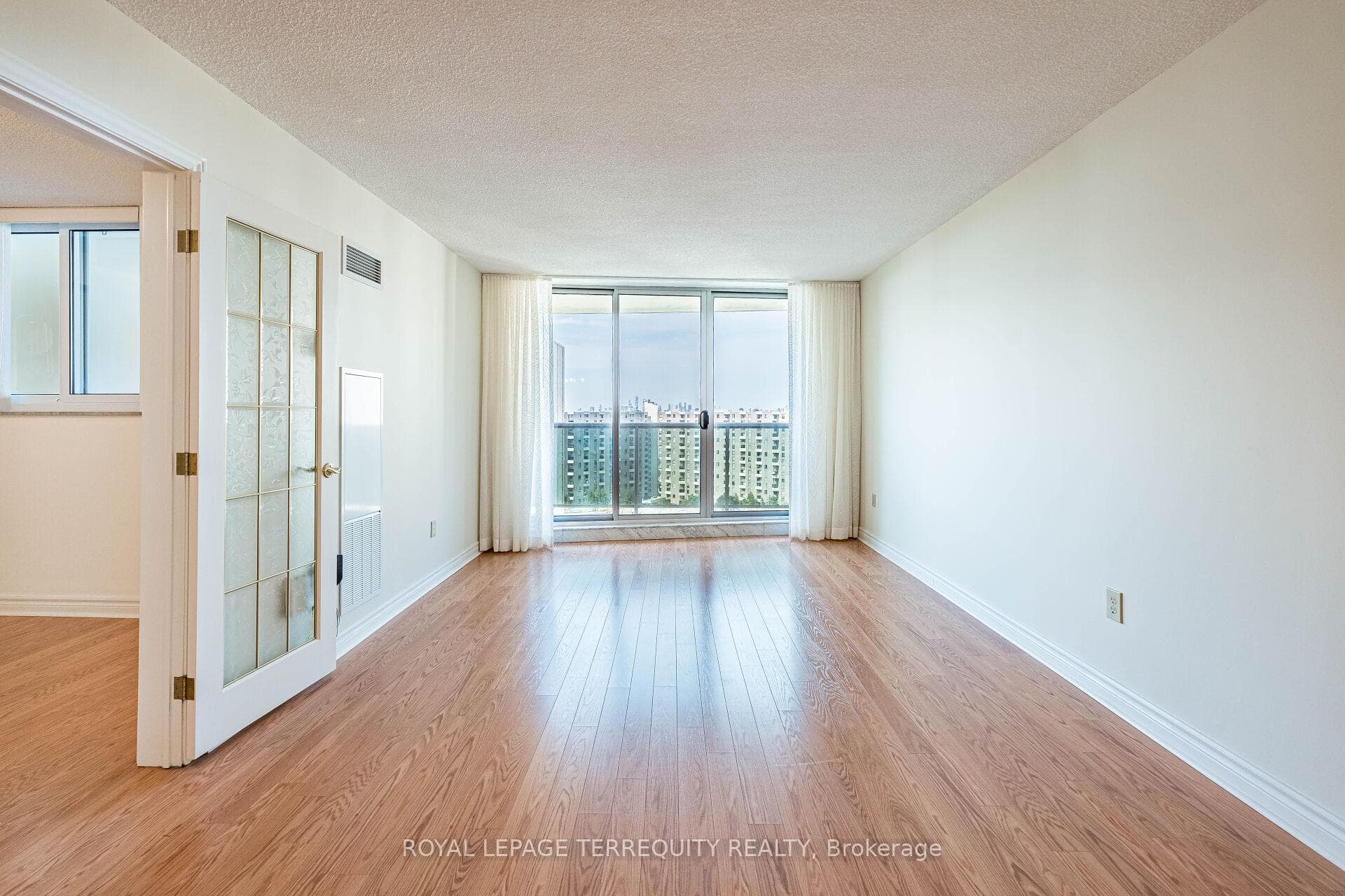 Living Room with Walk-out to Large Balcony