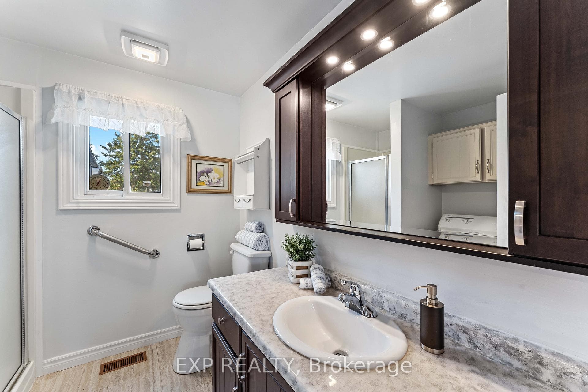 3pc Ensuite Bathroom with walk in shower & laundry