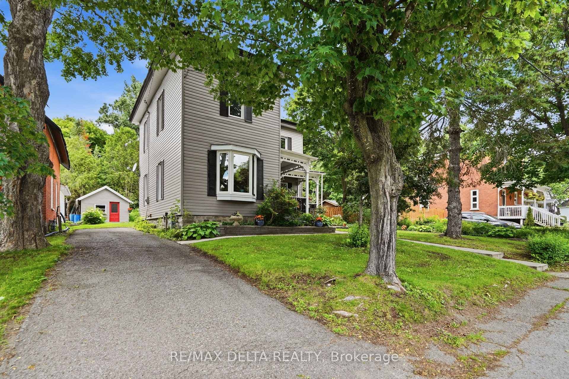Driveway at the left of the home.