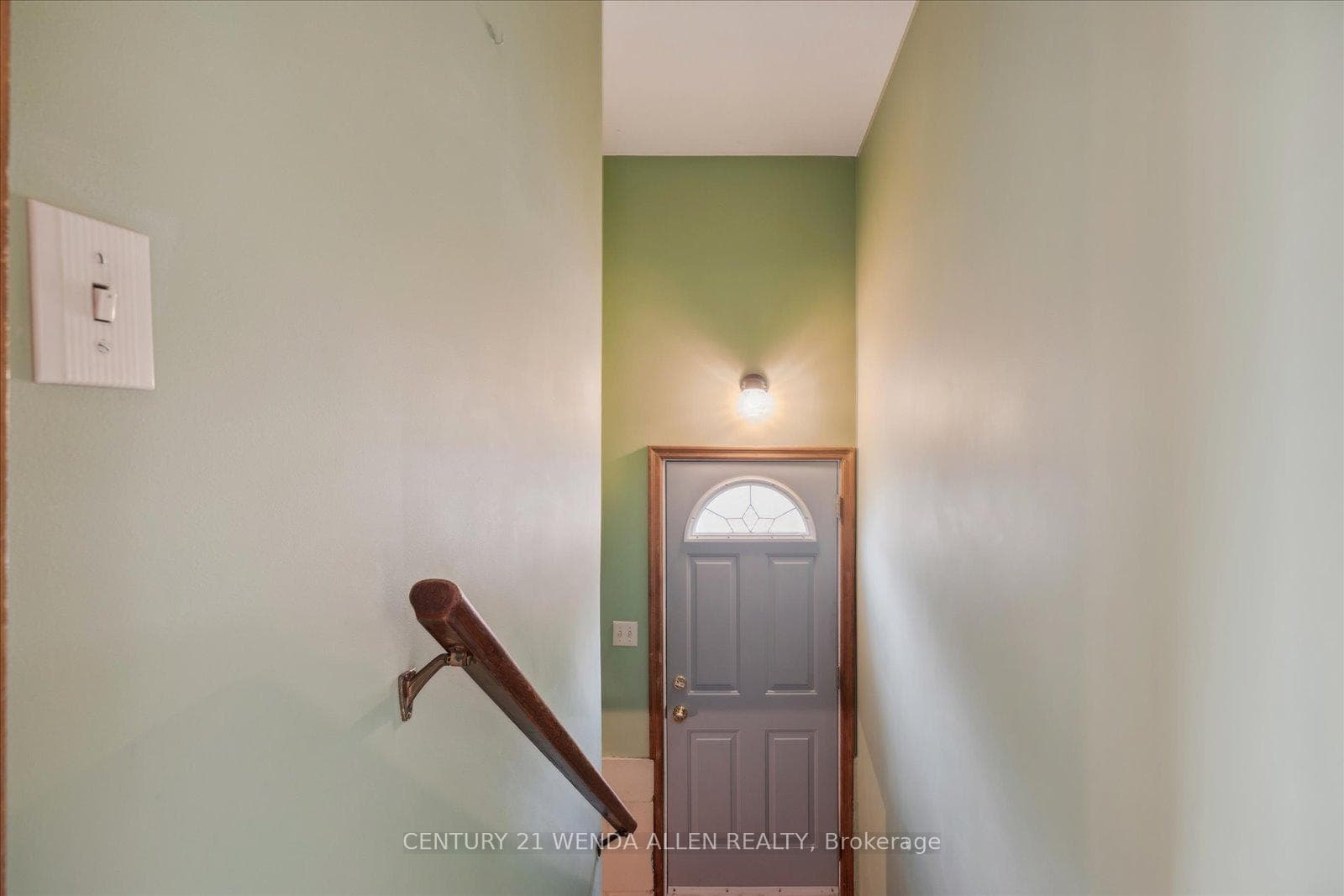Stairway to basement with separate entrance