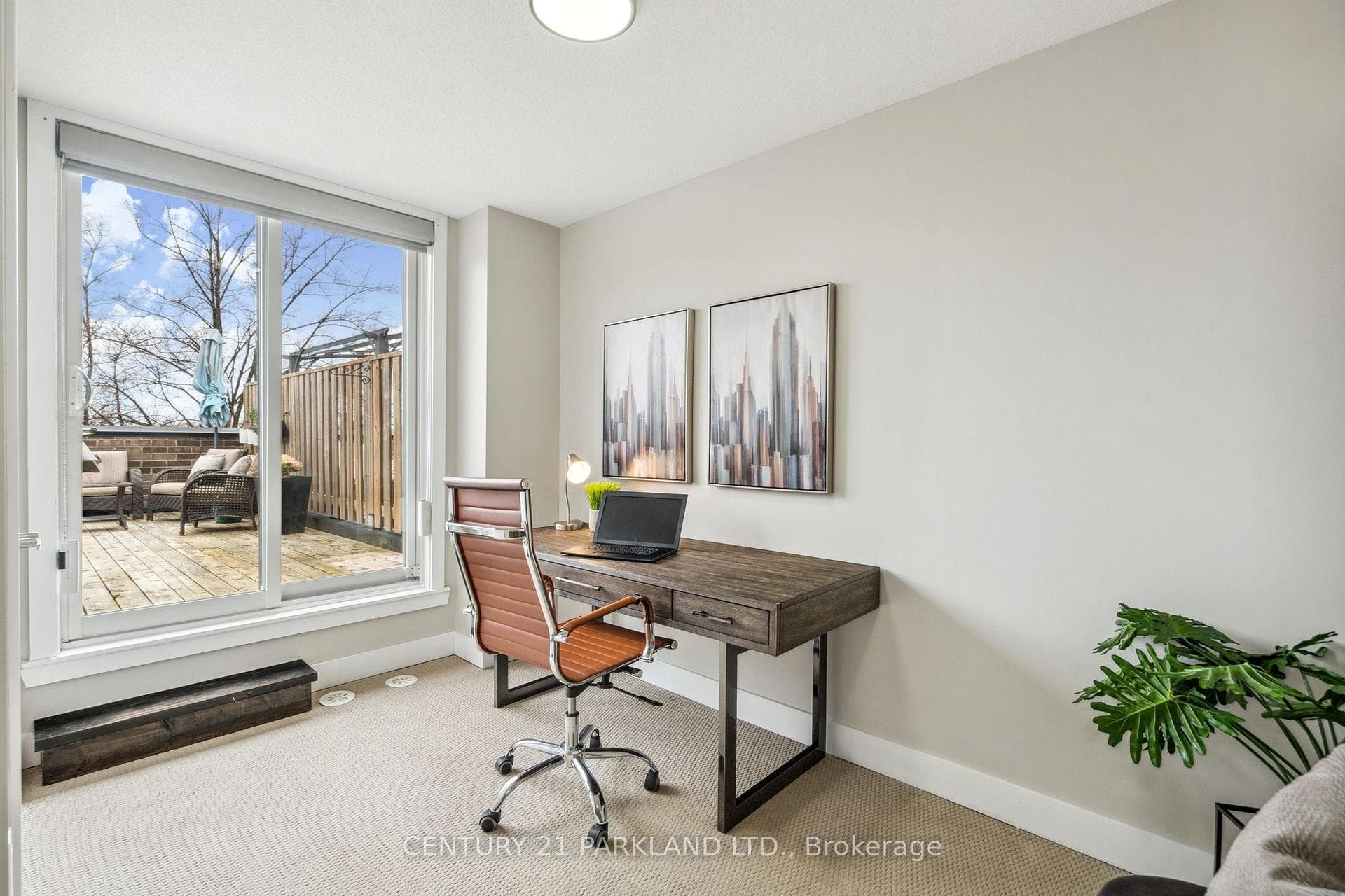 Large Den with walk out to private rooftop terrace