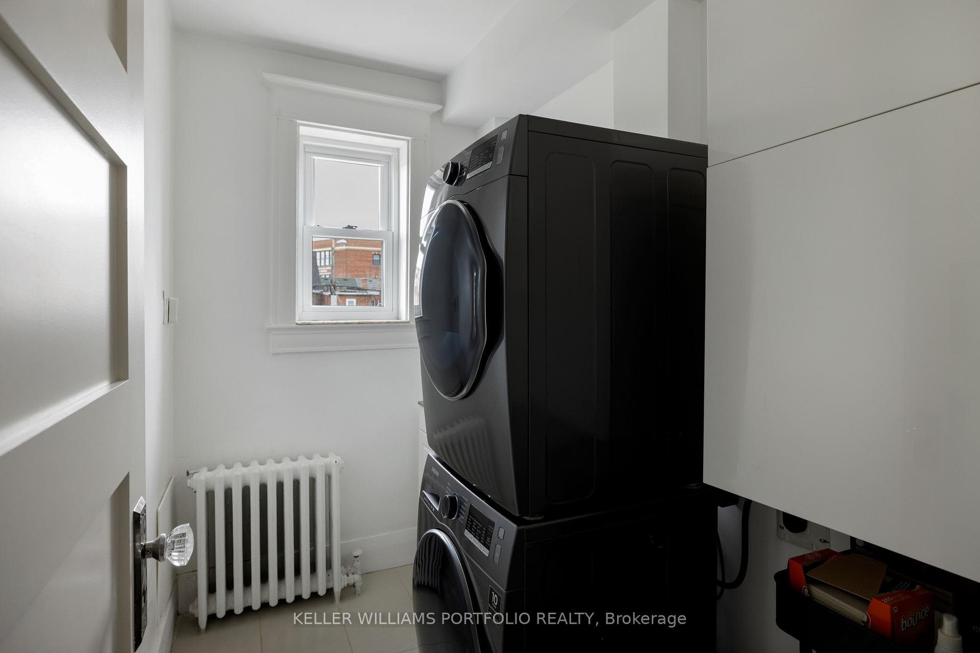 2nd floor laundry room with sink
