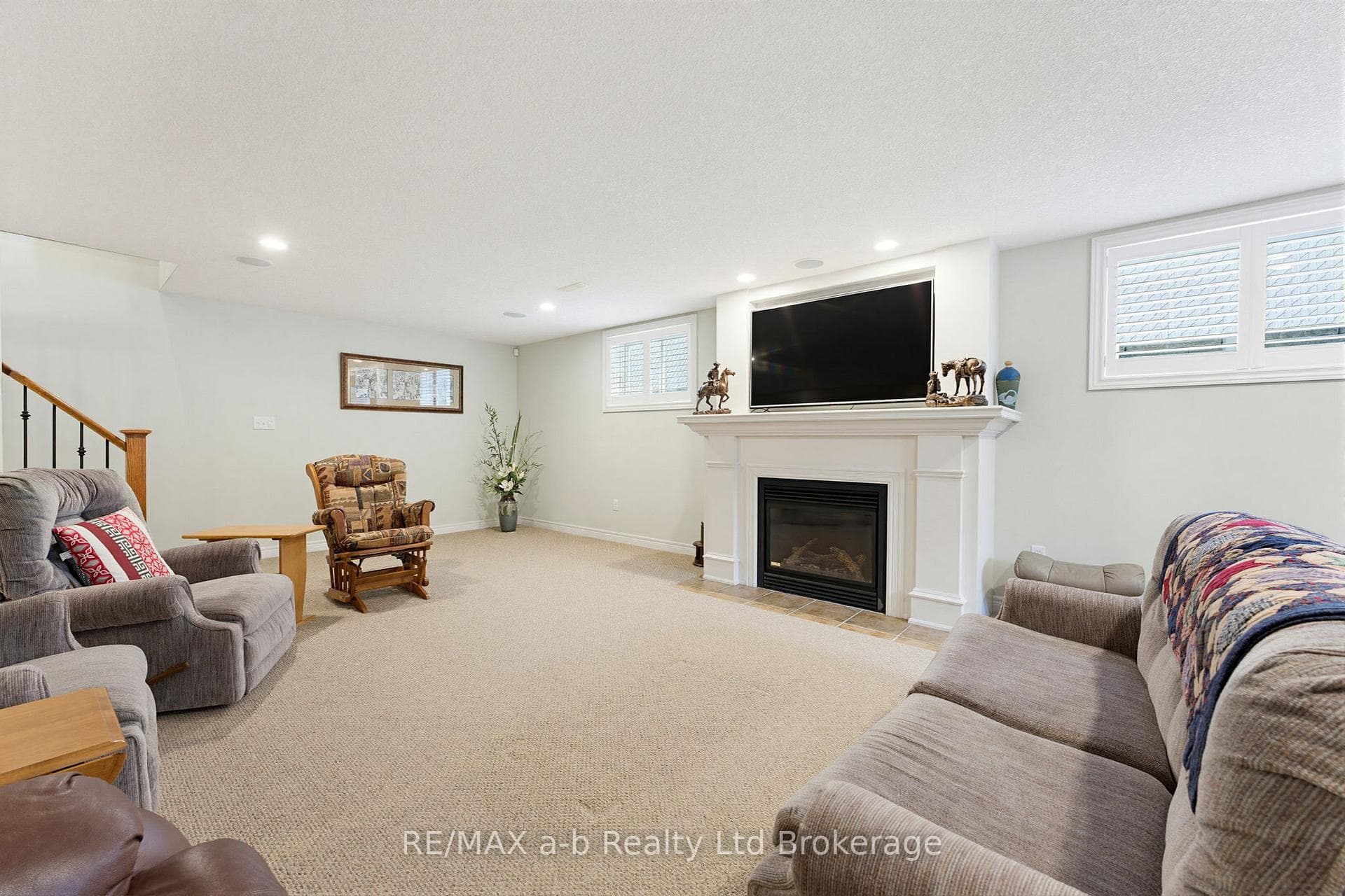 Finished basement with gas fireplace