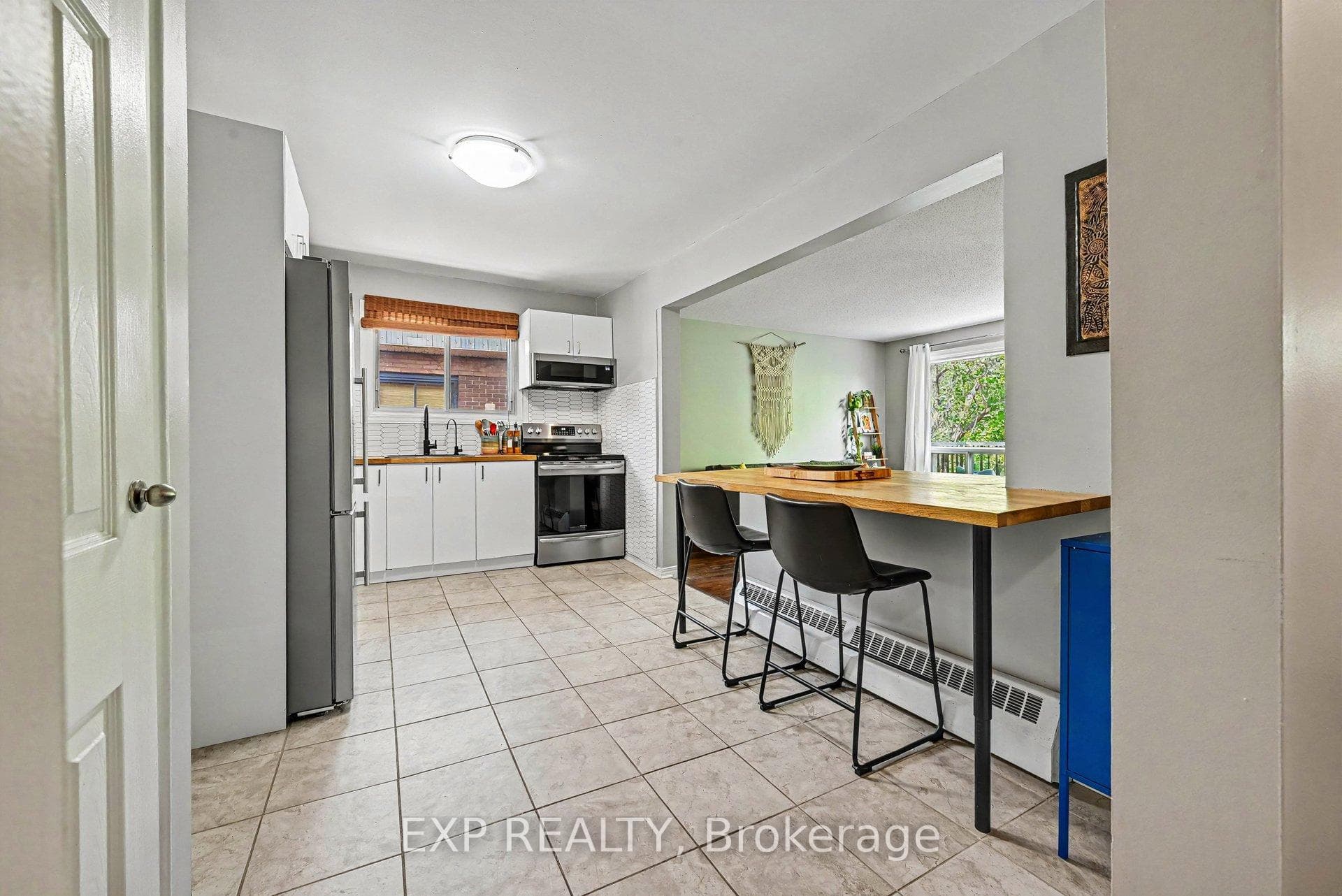 Stainless steel appliances included.