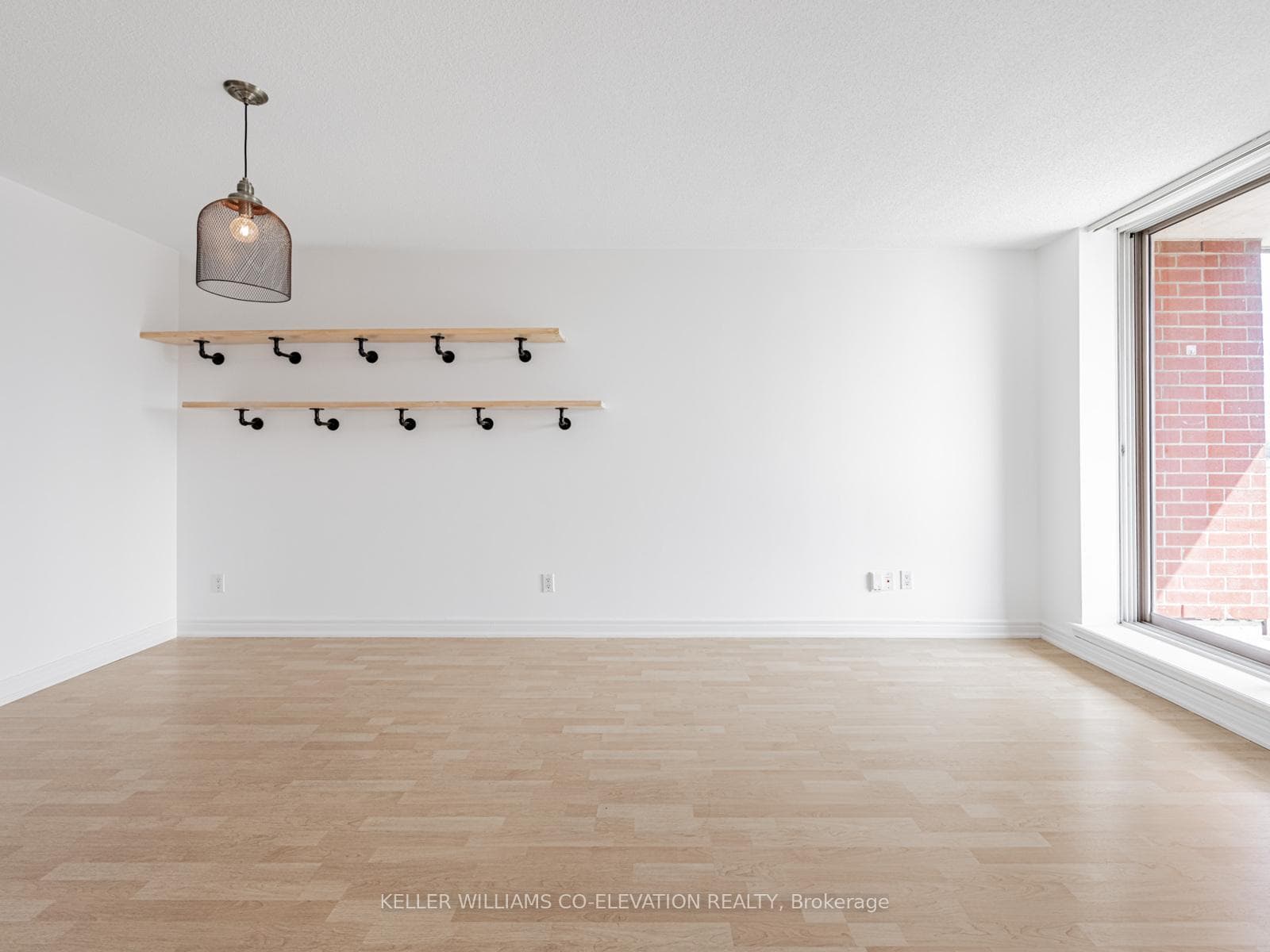 Spacious Dining Room With Wood Display Shelving