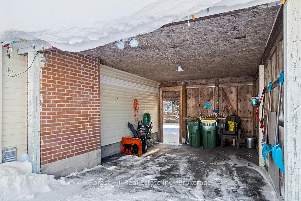 Carport with man-door to back yard