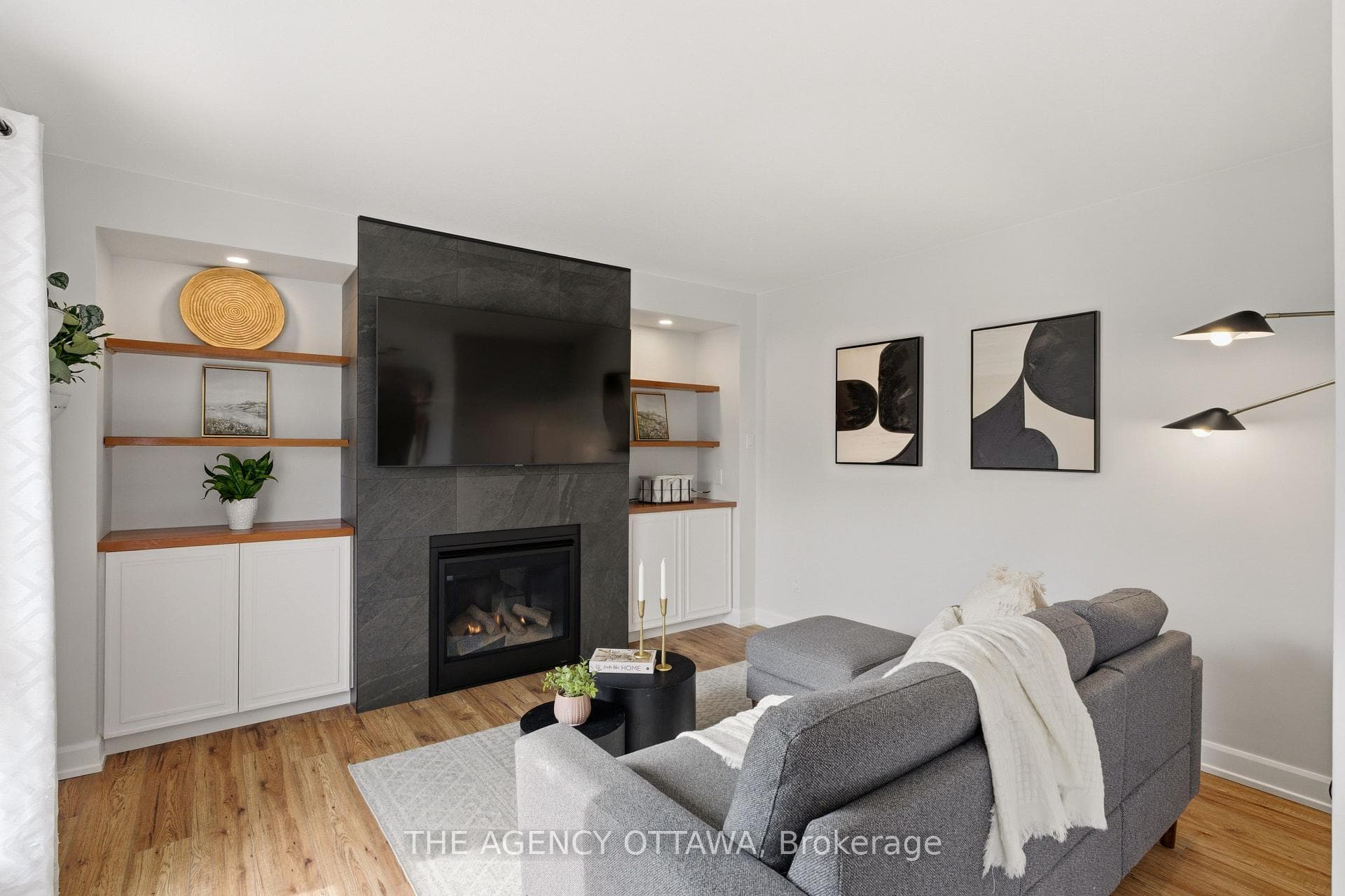Bright family room, fireplace & designer accents