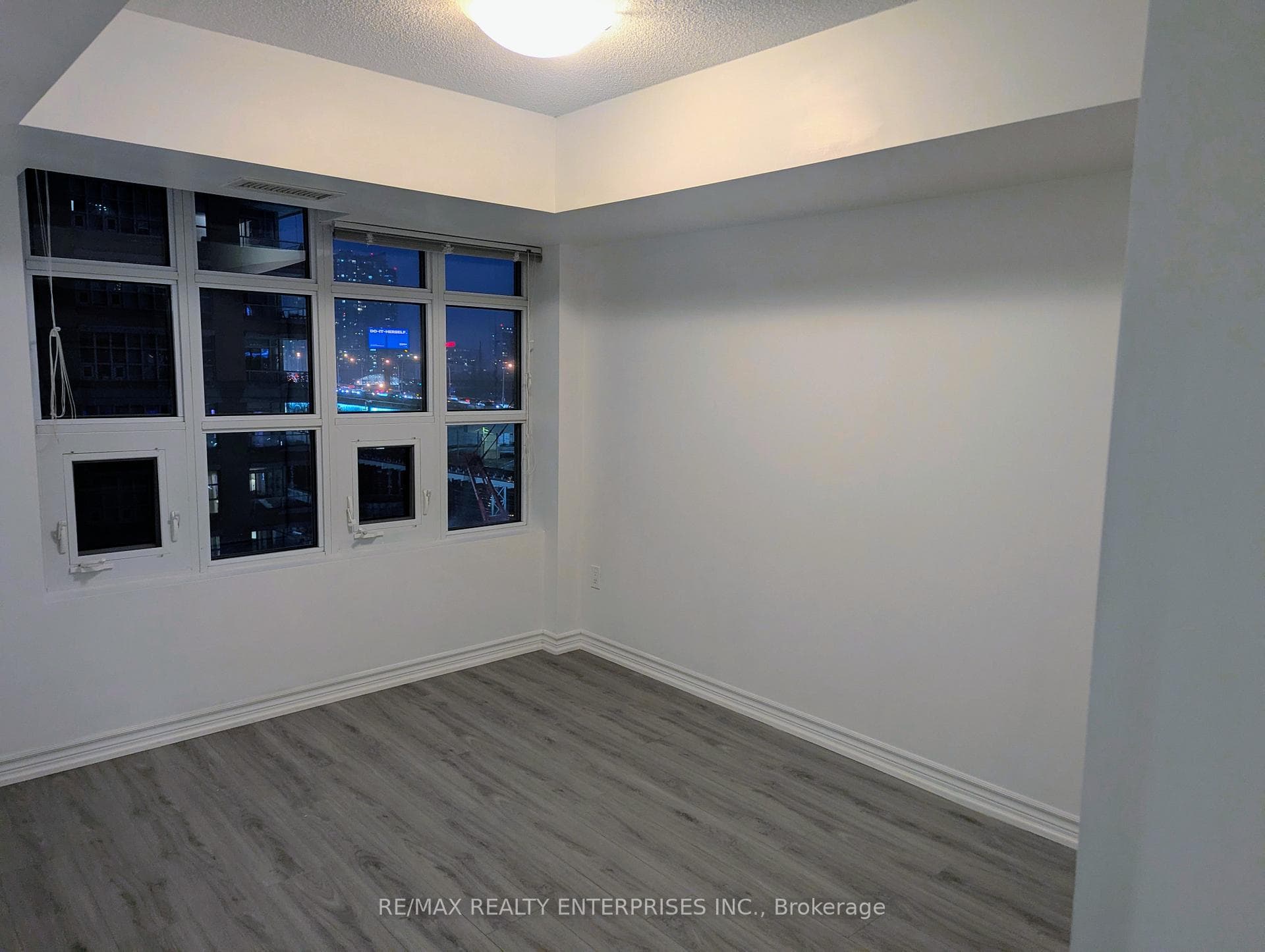 Primary bedroom with lots of windows
