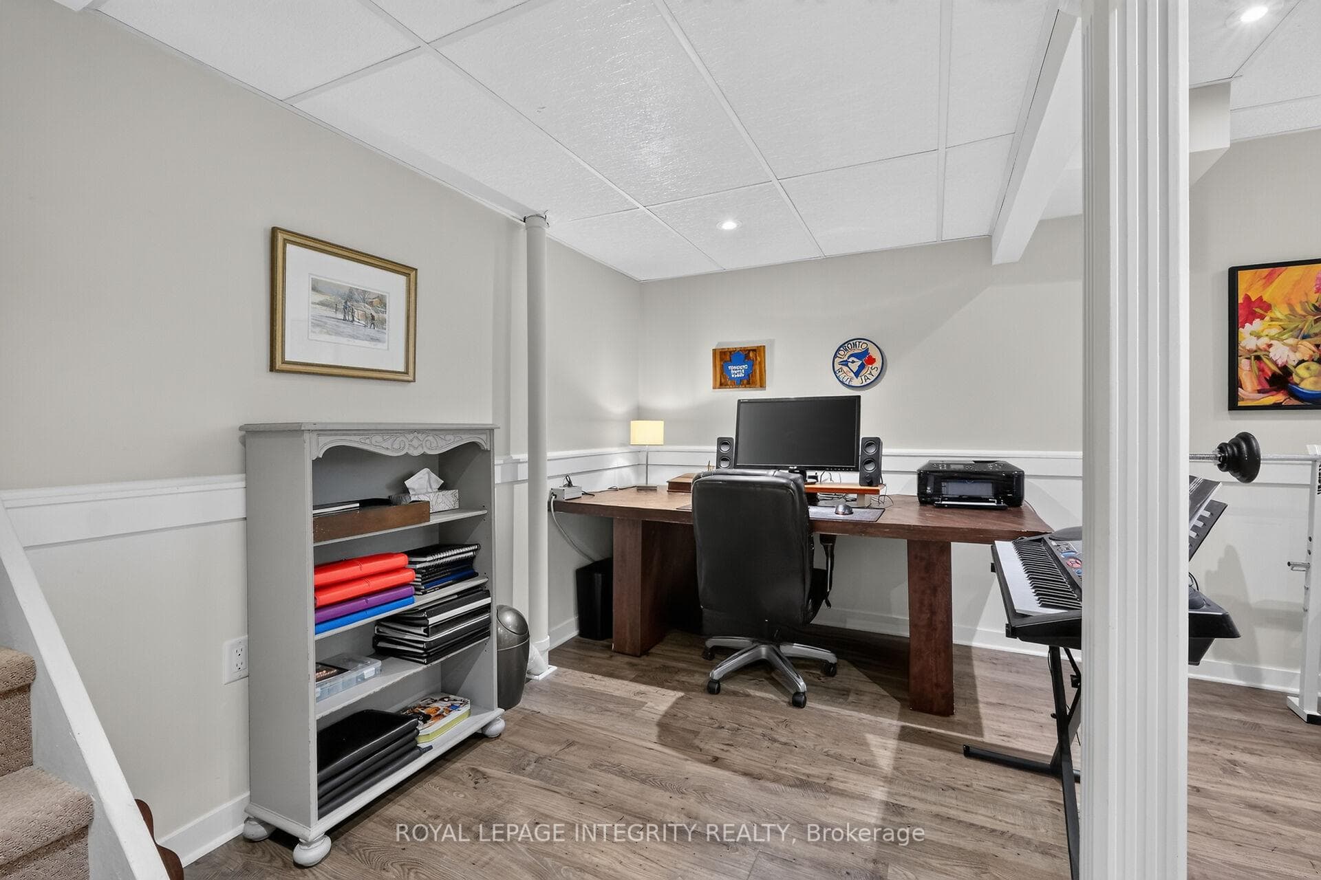Office is located at the bottom of the stairs