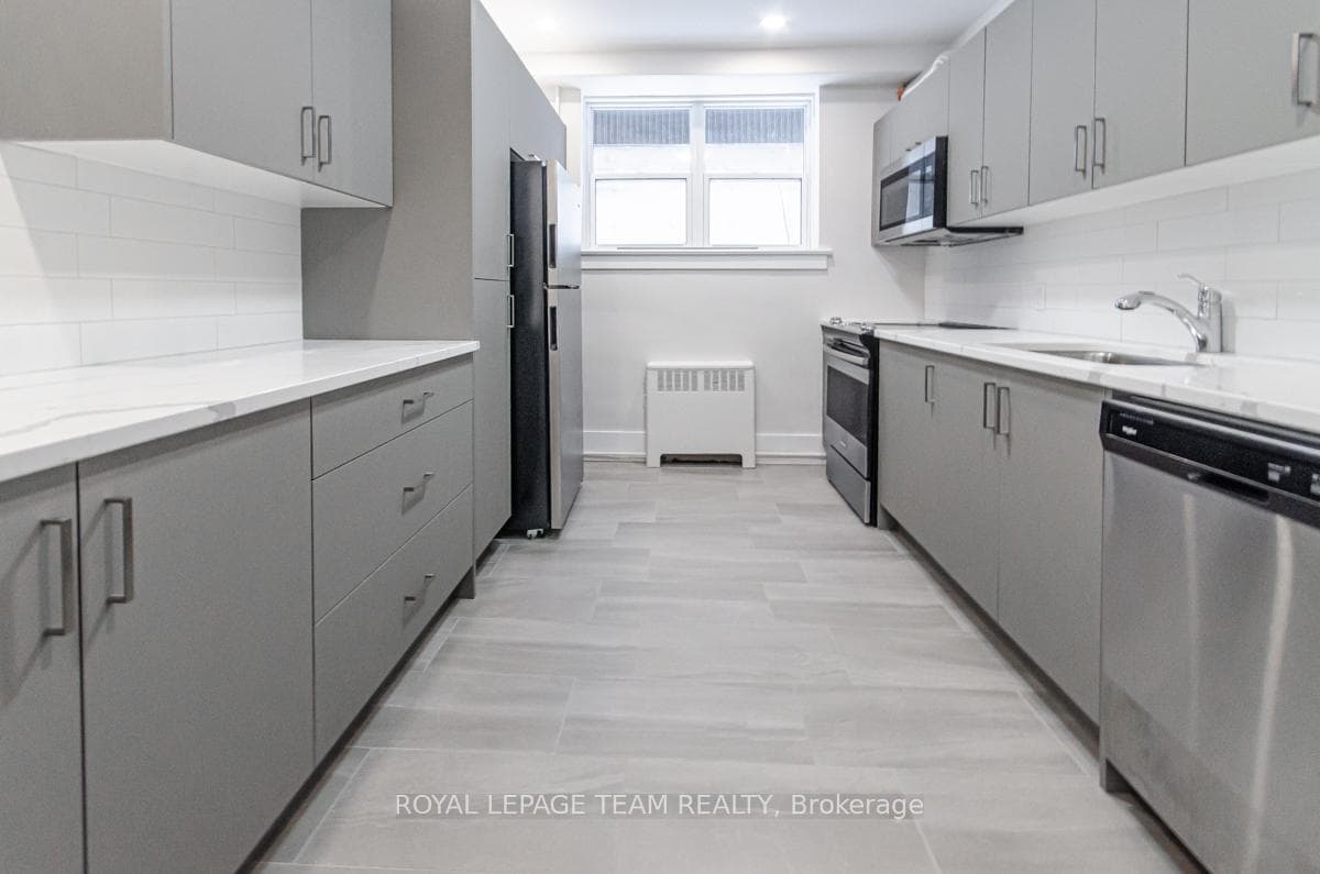Galley Kitchen features stainless steal appliances