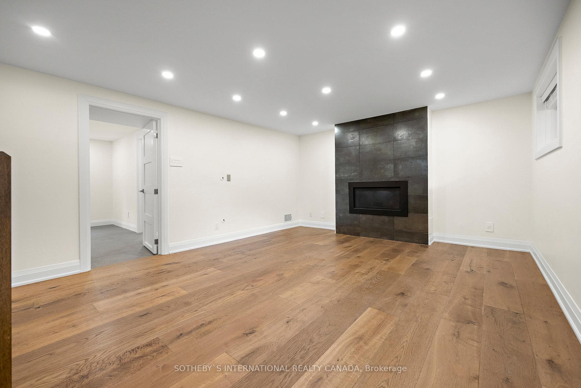 Lower Level Family Room with Gas Fireplace