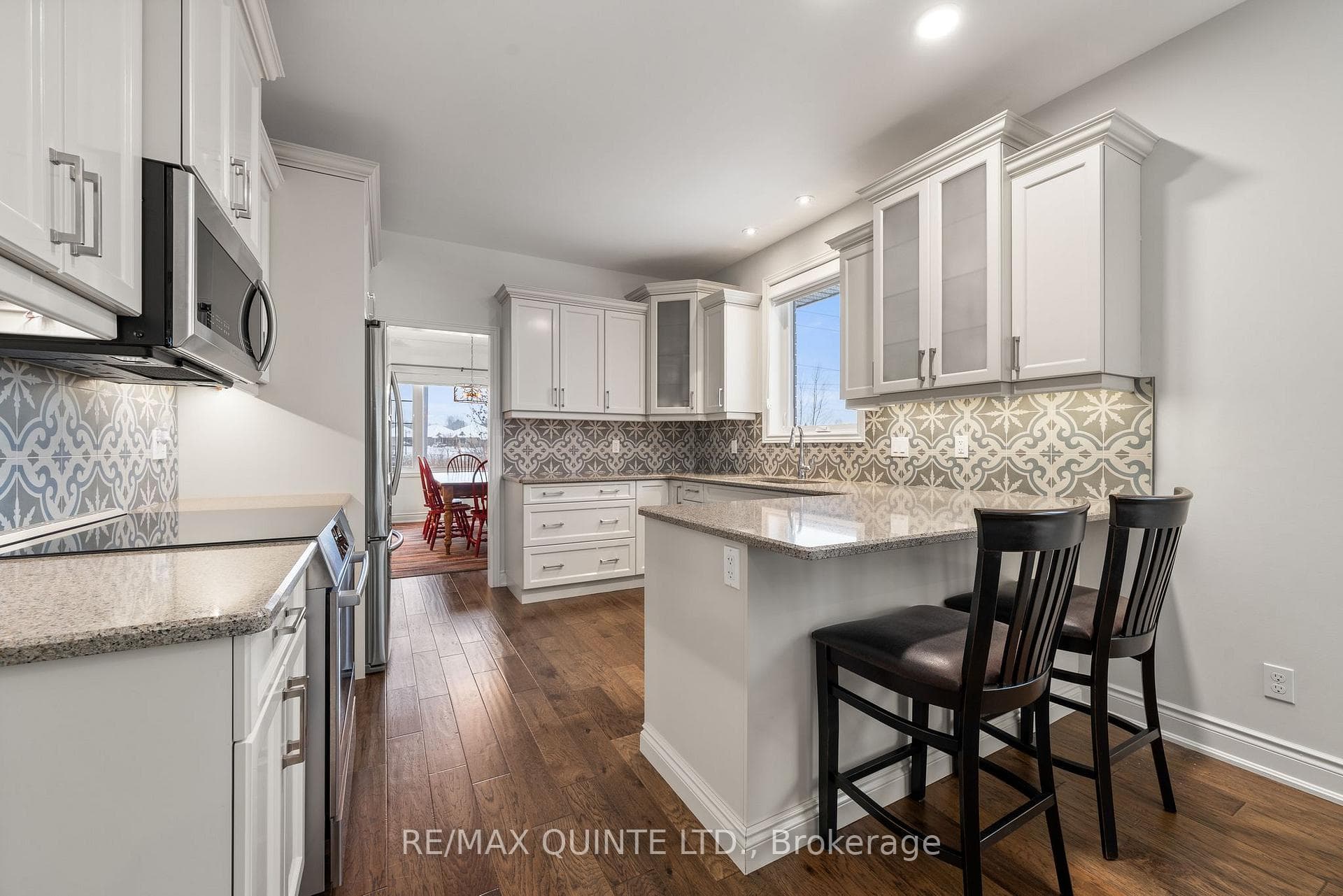 Eat-in breakfast bar in luxurious kitchen.