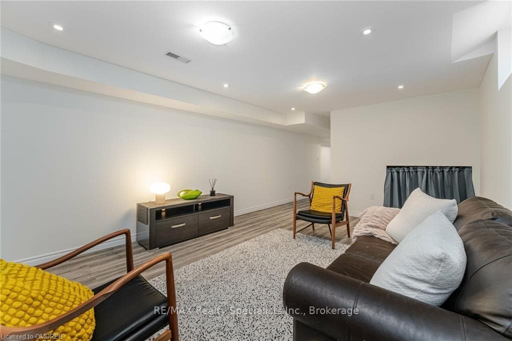 Living room featuring hardwood / wood-style floori