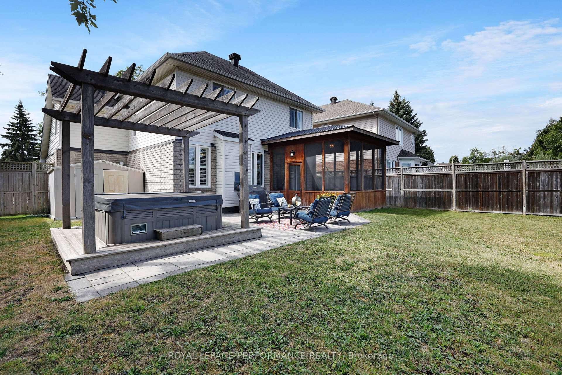 Relax in the hot tub in your backyard oasis
