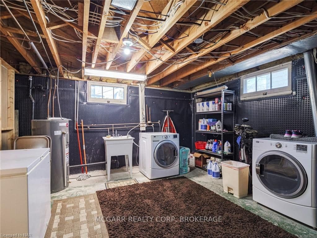 The laundry is located in the utility room & there