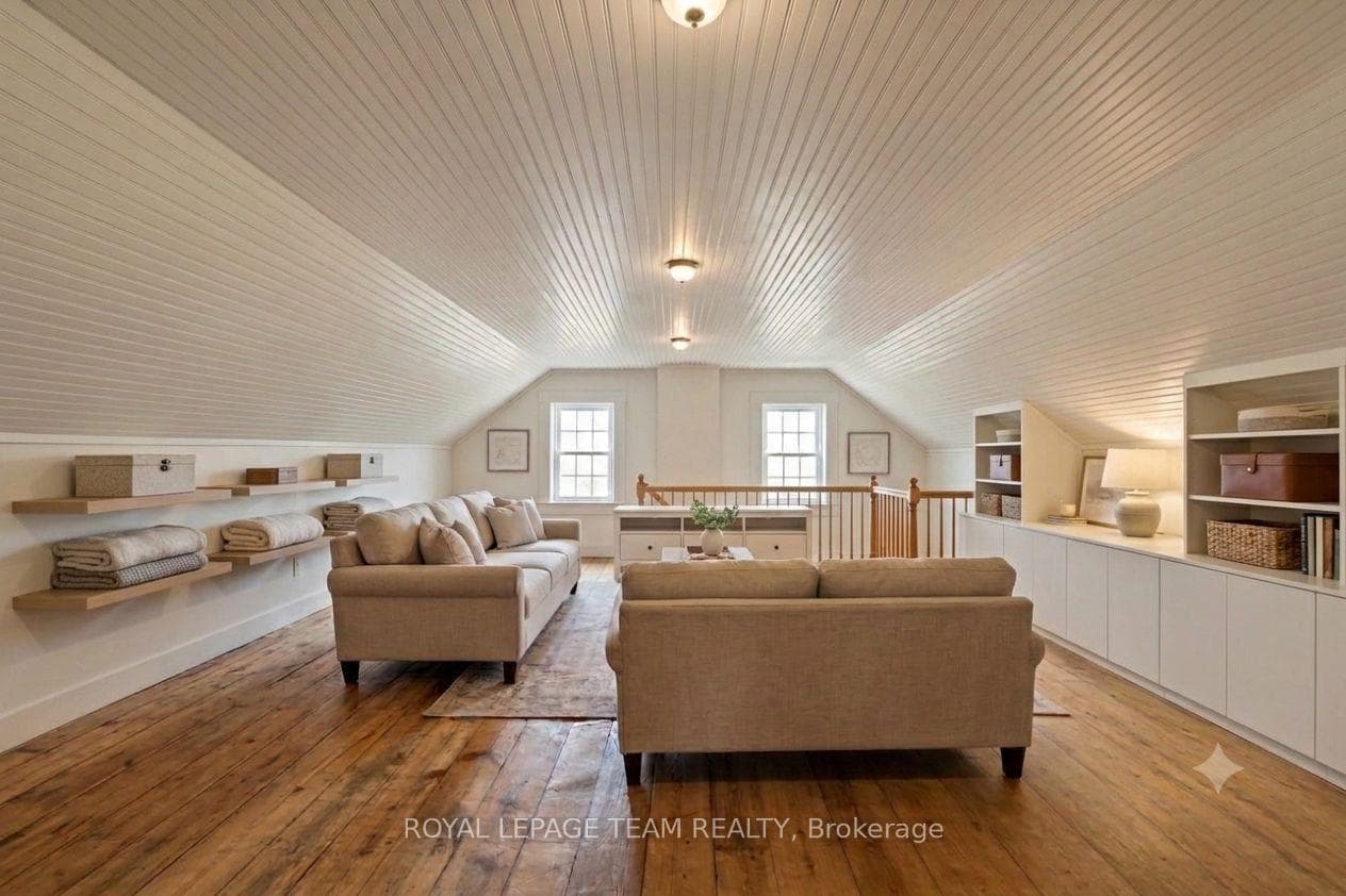 Staged rec room off of bathroom, above kitchen.