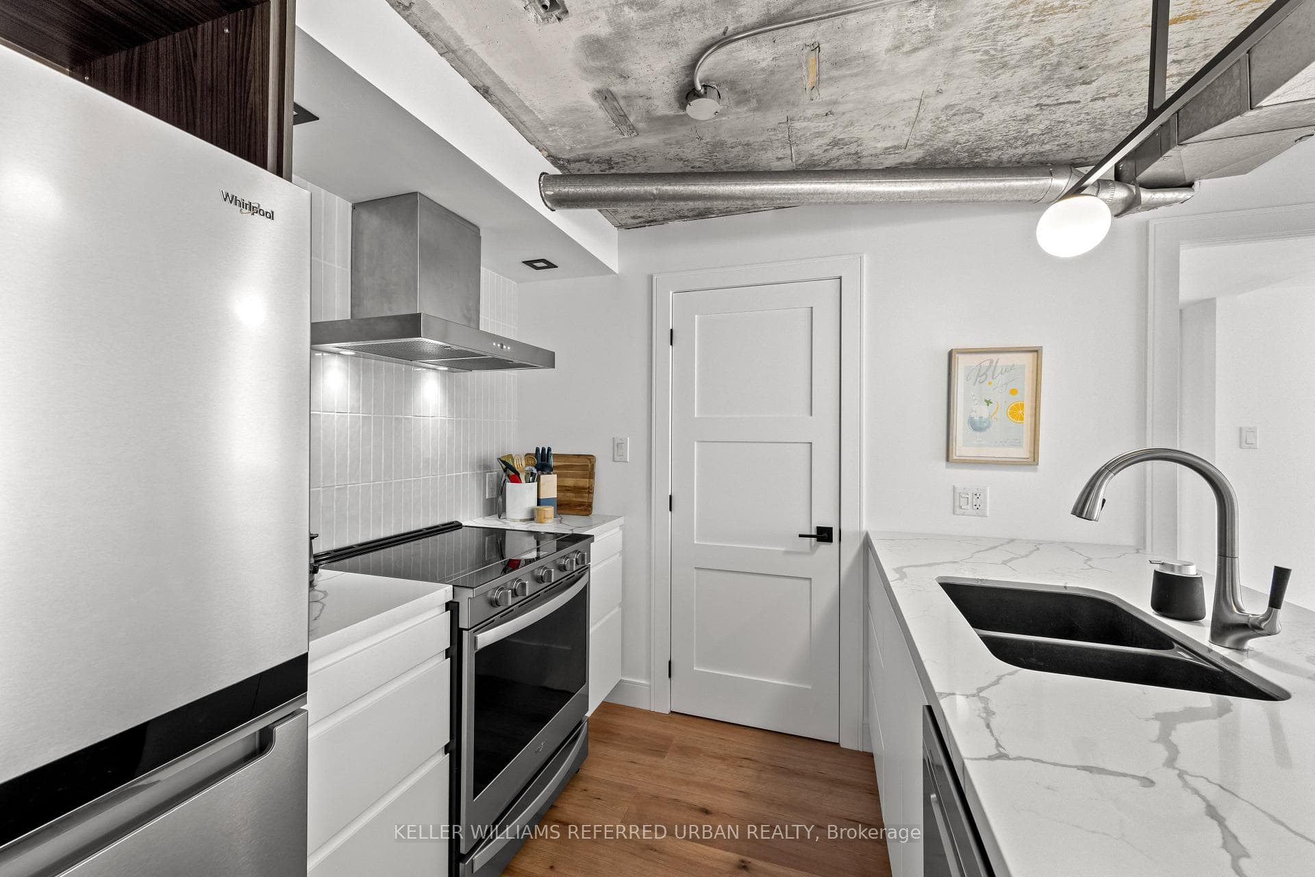 Open Concept Kitchen w Stainless Steel Appliances