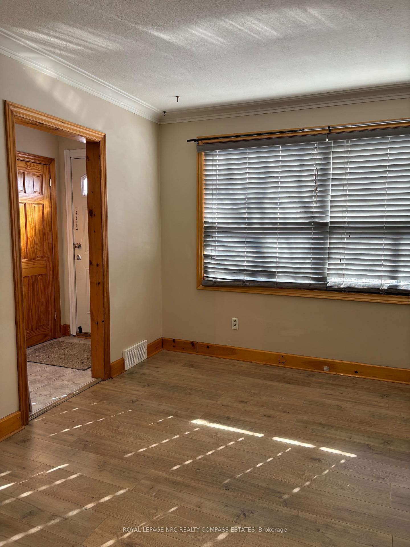 FRON ENTRANCE/UPPER LIVING ROOM