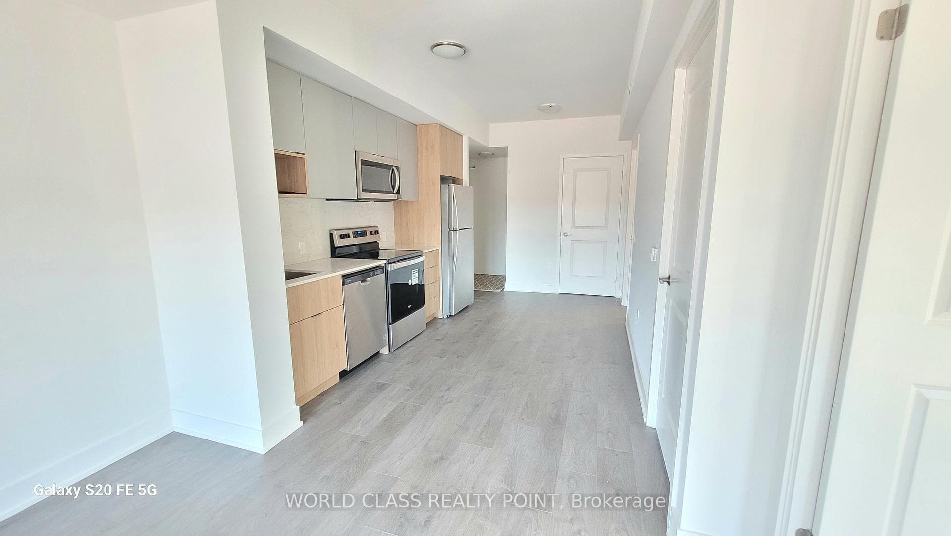 Open Concept Kitchen - Stainless Steel Appliances