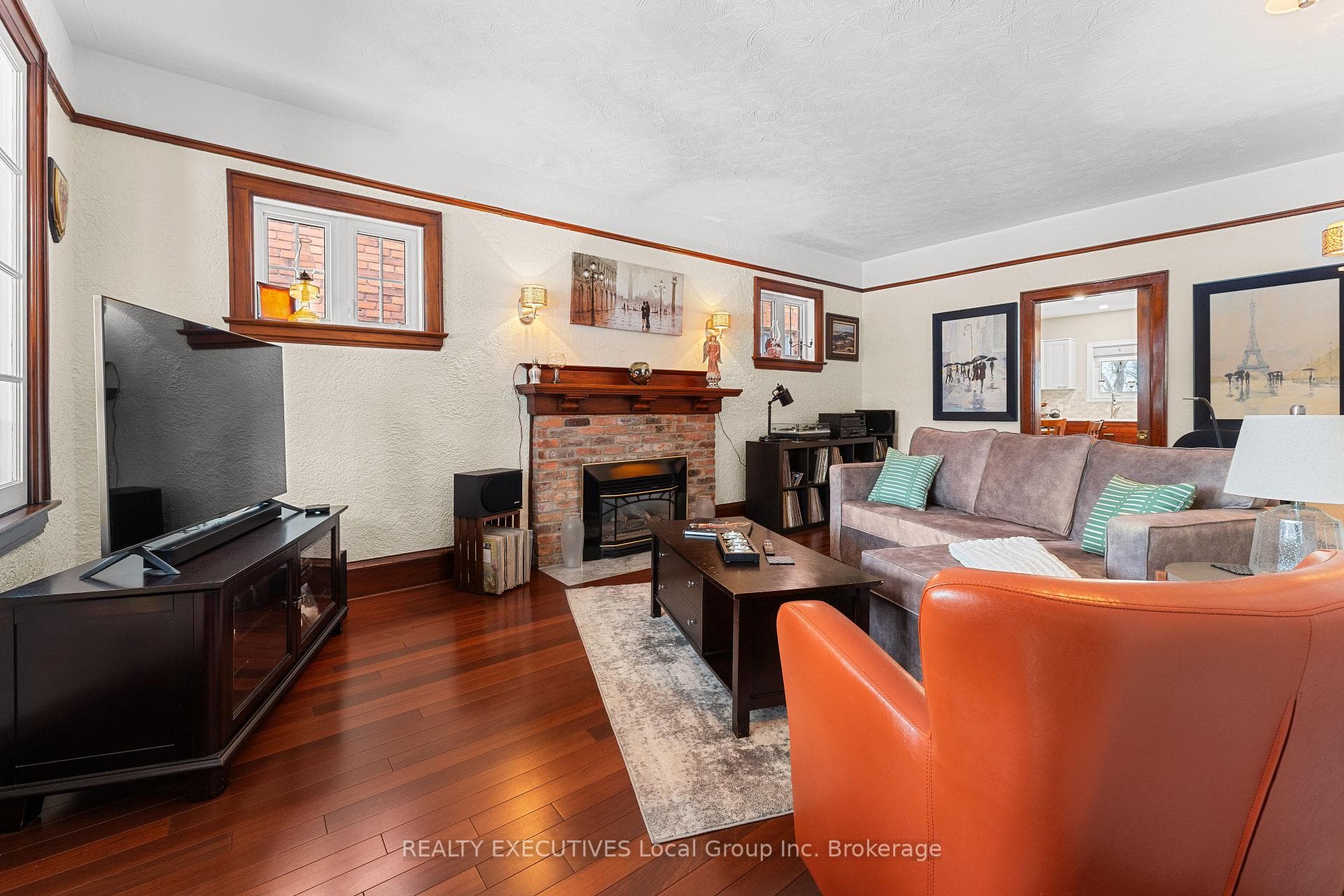 The living room has a gas fireplace