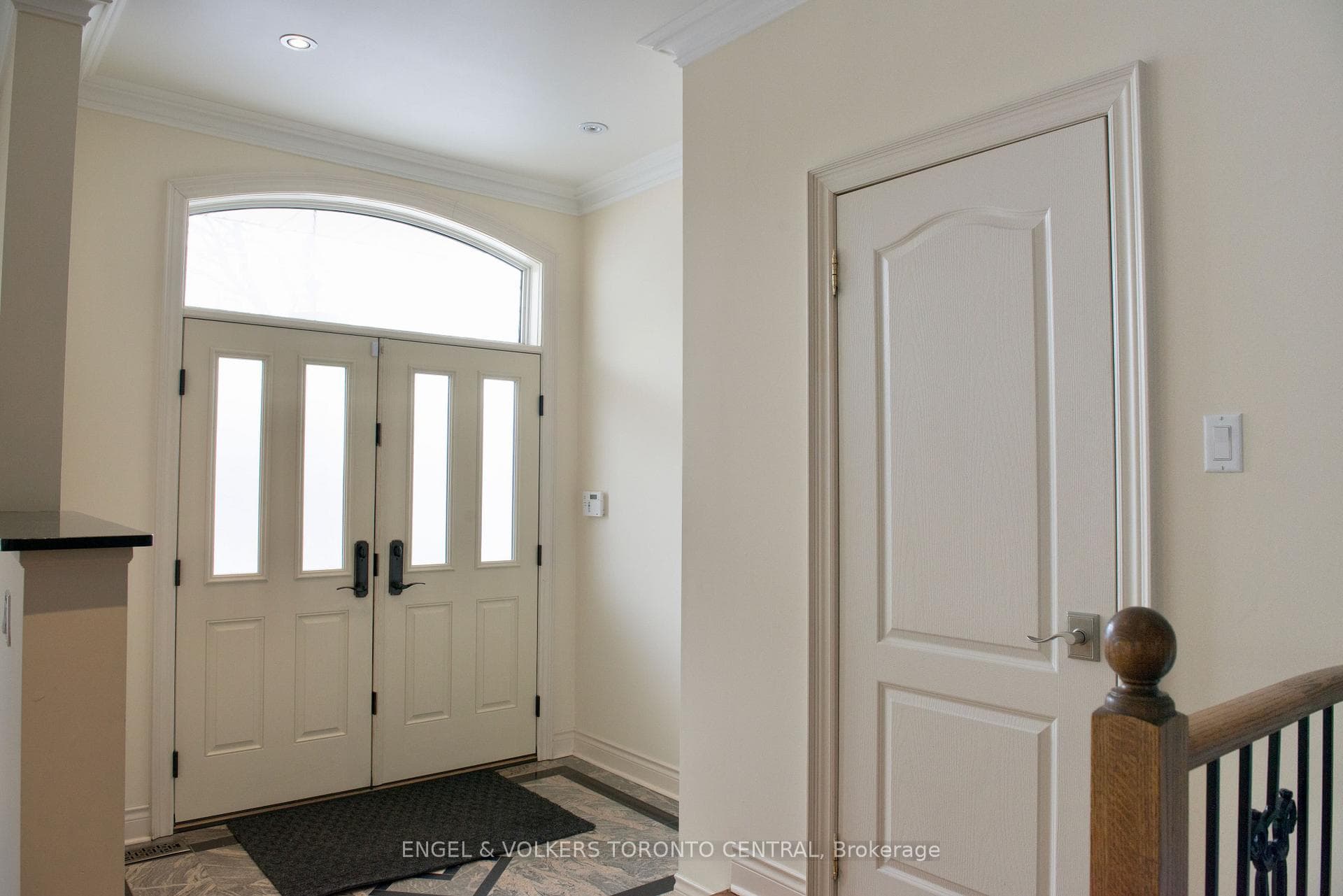 Foyer with Marble Flooring and Large Closet